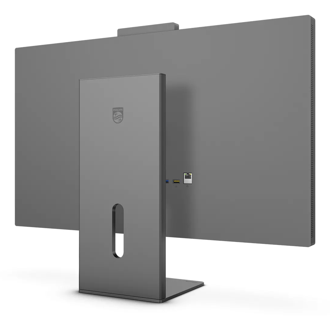 Widok z tyłu szarego komputera Philips All-in-One. Widoczny jest monitor, podstawka, porty i logo Philips.
