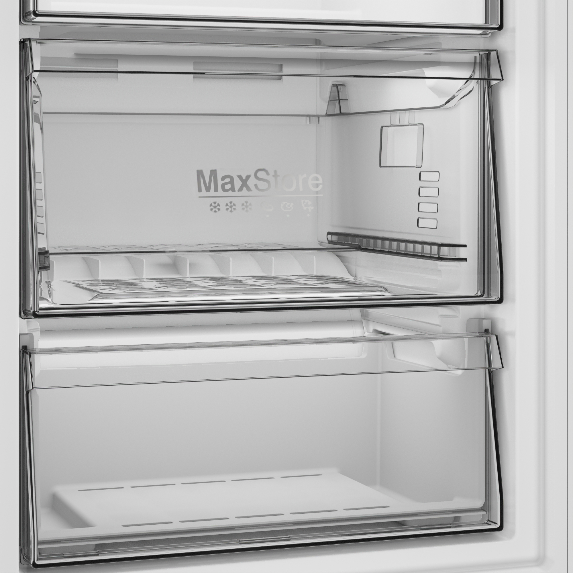Şeffaf çekmeceli buzdolabının iç kısmının yakın çekimi. MaxStore logosu ve çeşitli bölmeler bulunur. Çekmecelerde raflar ve bölücüler vardır.