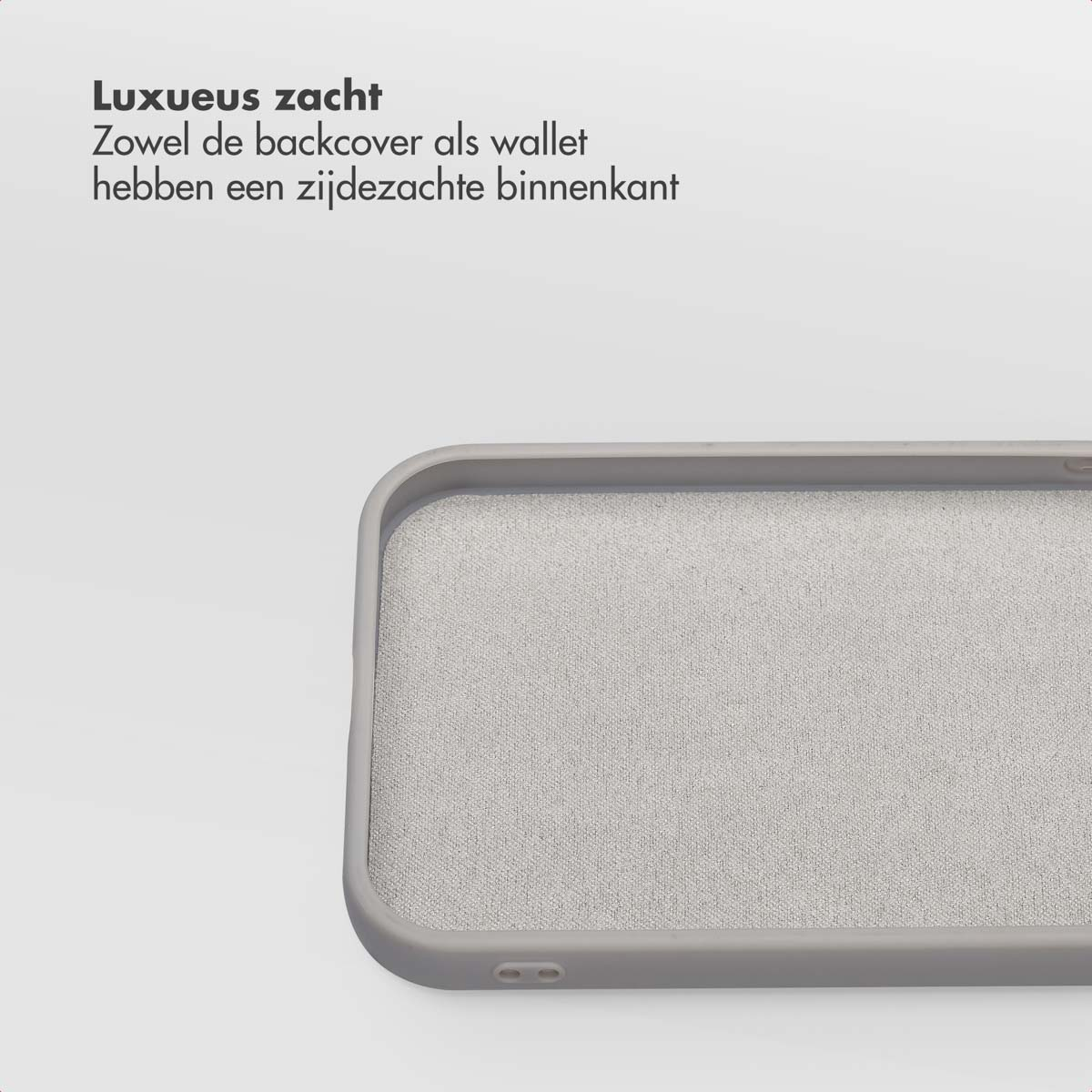 Gros plan sur une coque de téléphone. La coque est grise avec un intérieur doux. Texte en néerlandais en haut à gauche.