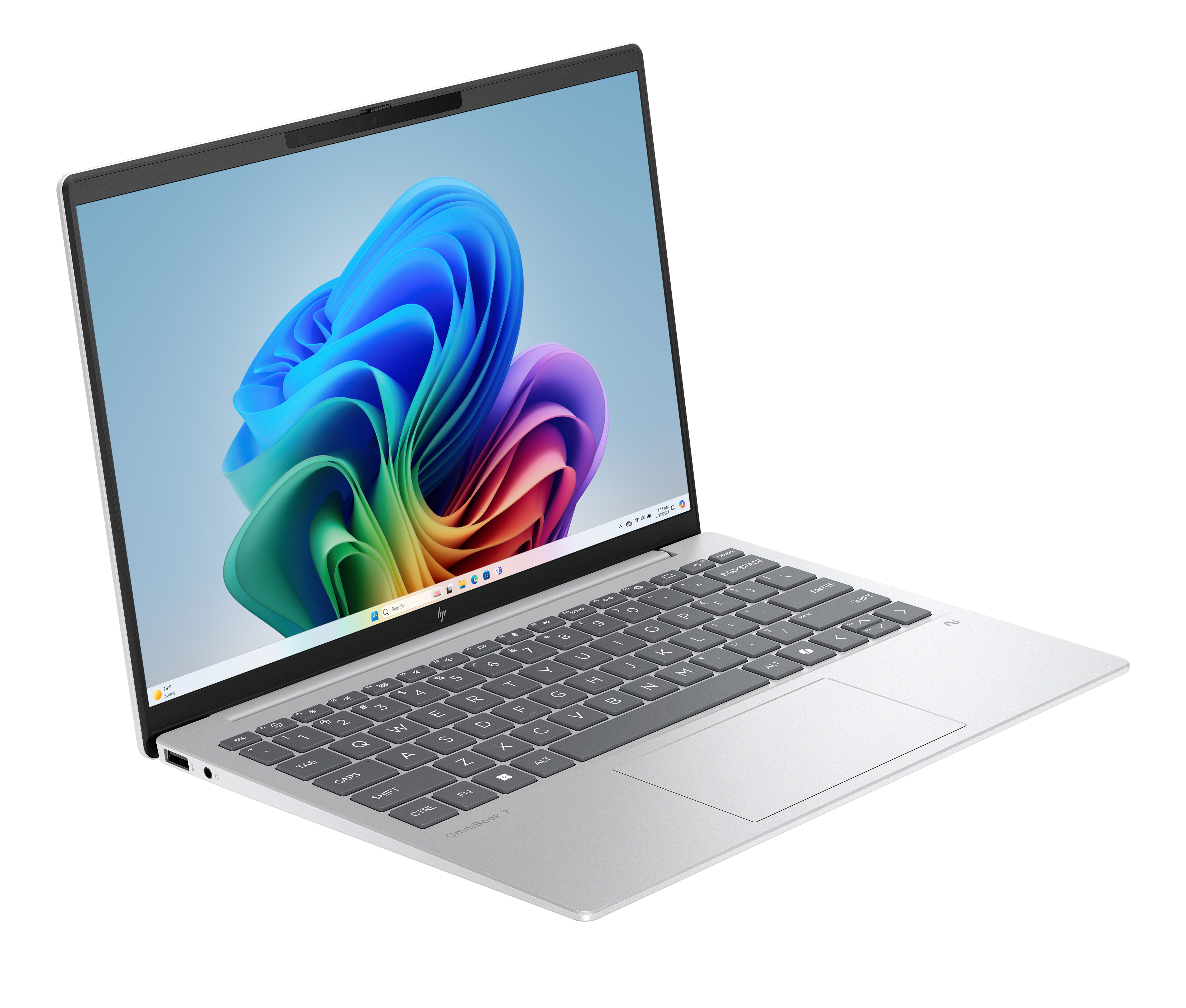 Zilveren laptop, open, met kleurrijke abstracte bureaubladachtergrond. Toetsenbord en touchpad zichtbaar. Het scherm staat omhoog.