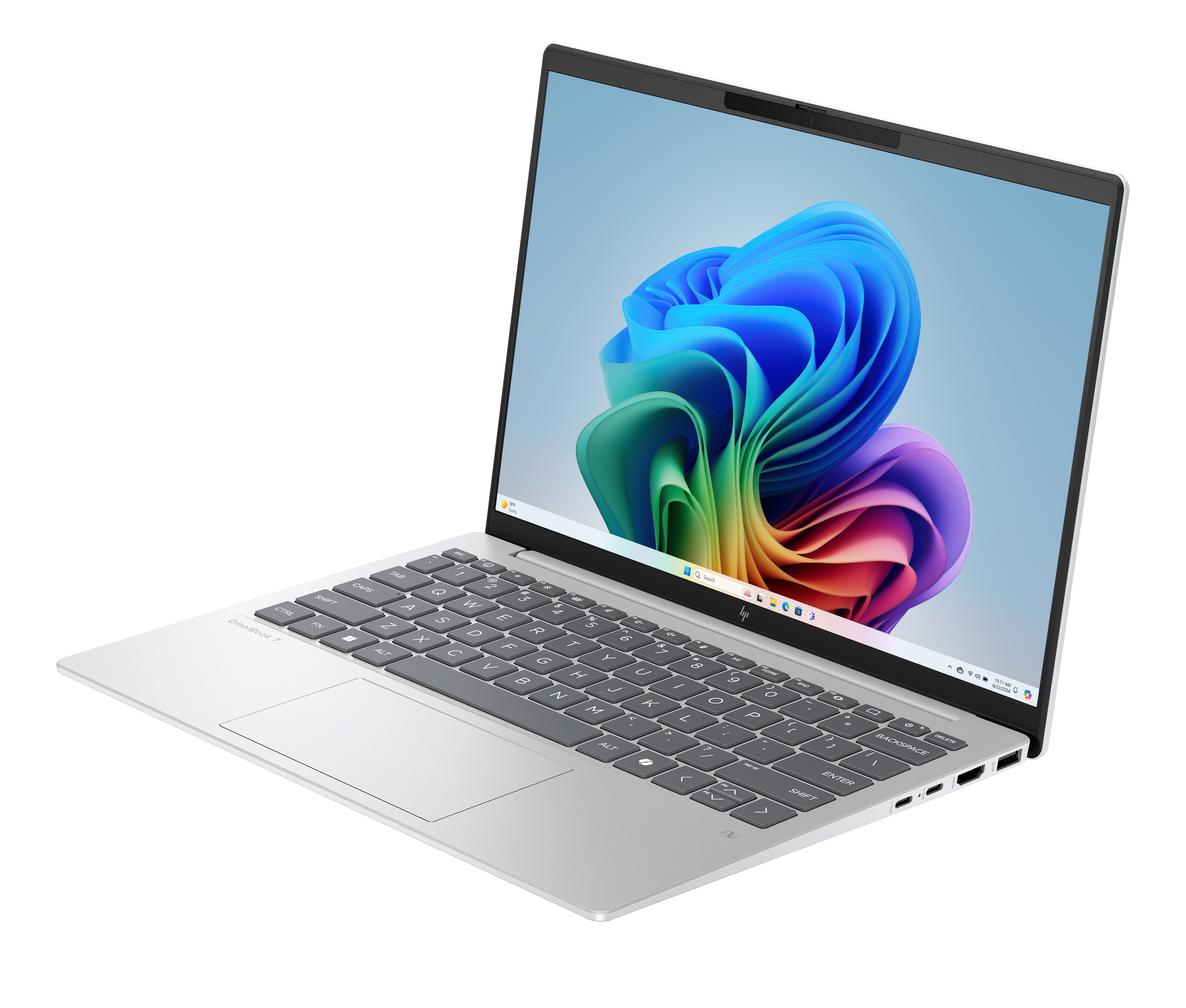 Silver laptop with a screen displaying a colorful abstract design. Keyboard visible, open on a white surface.