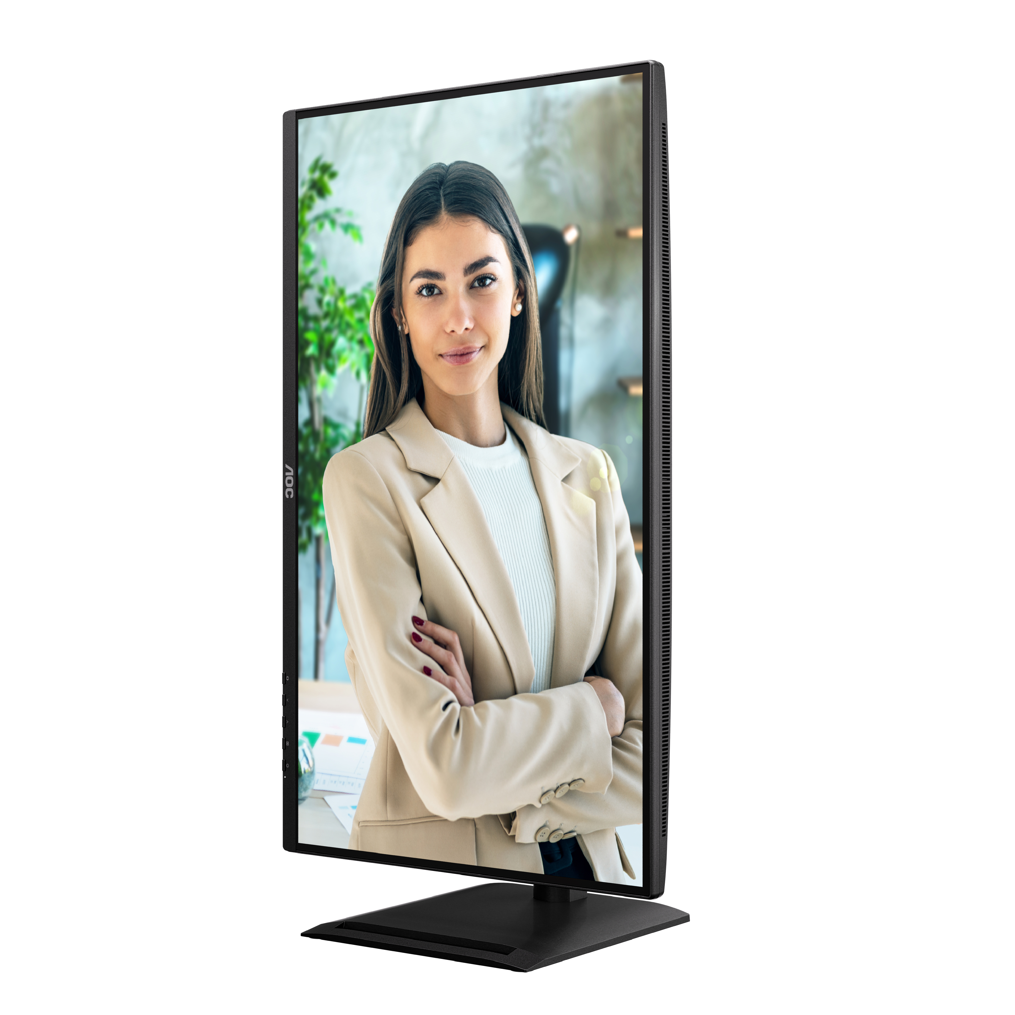 Een vrouw in een beige blazer wordt weergegeven op een computermonitor. Ze heeft de armen gekruist en glimlacht. De monitor is zwart.