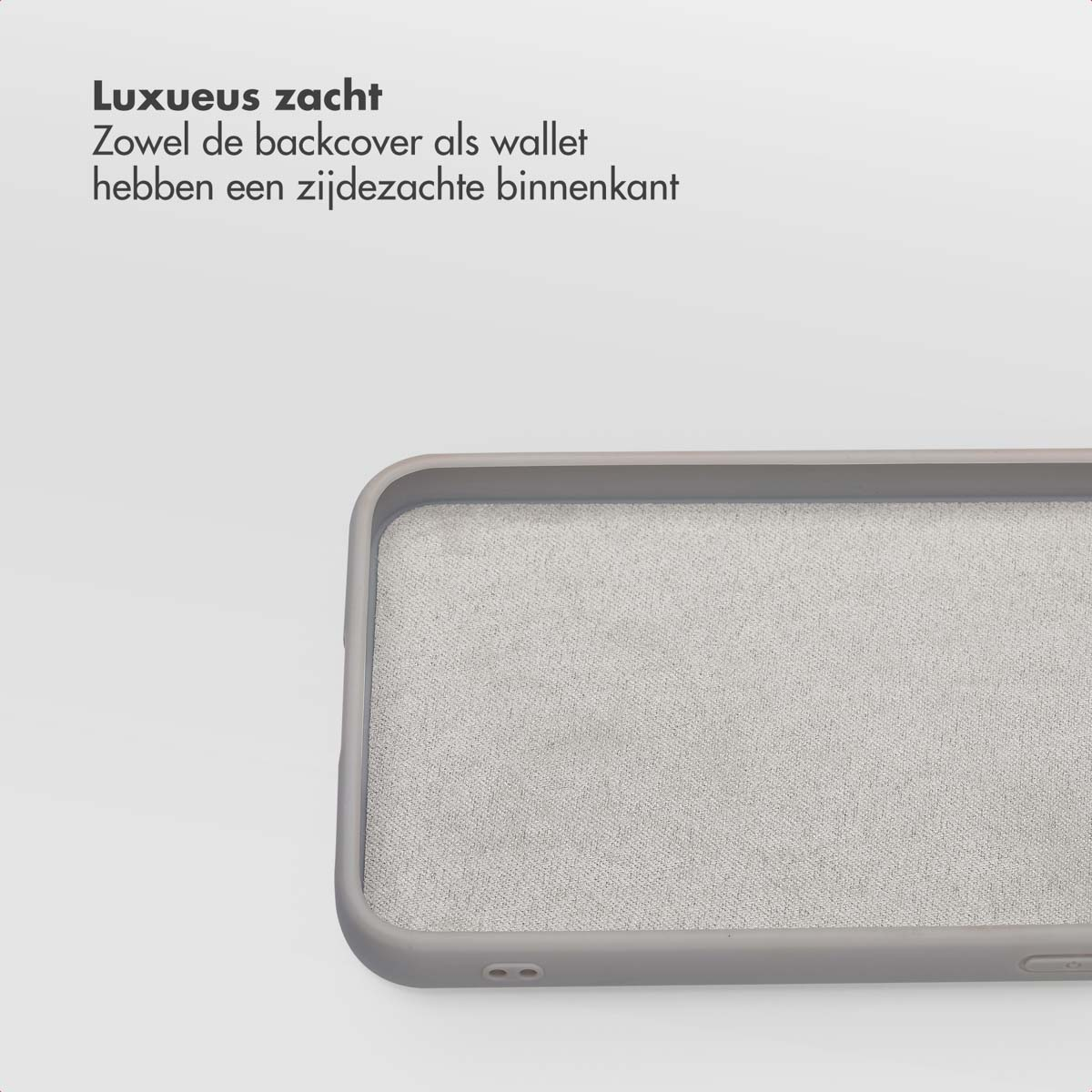 Close-up van een telefoonhoesje met een grijs frame en een gestructureerd, lichtgrijs interieur. De achtergrond is effen wit.