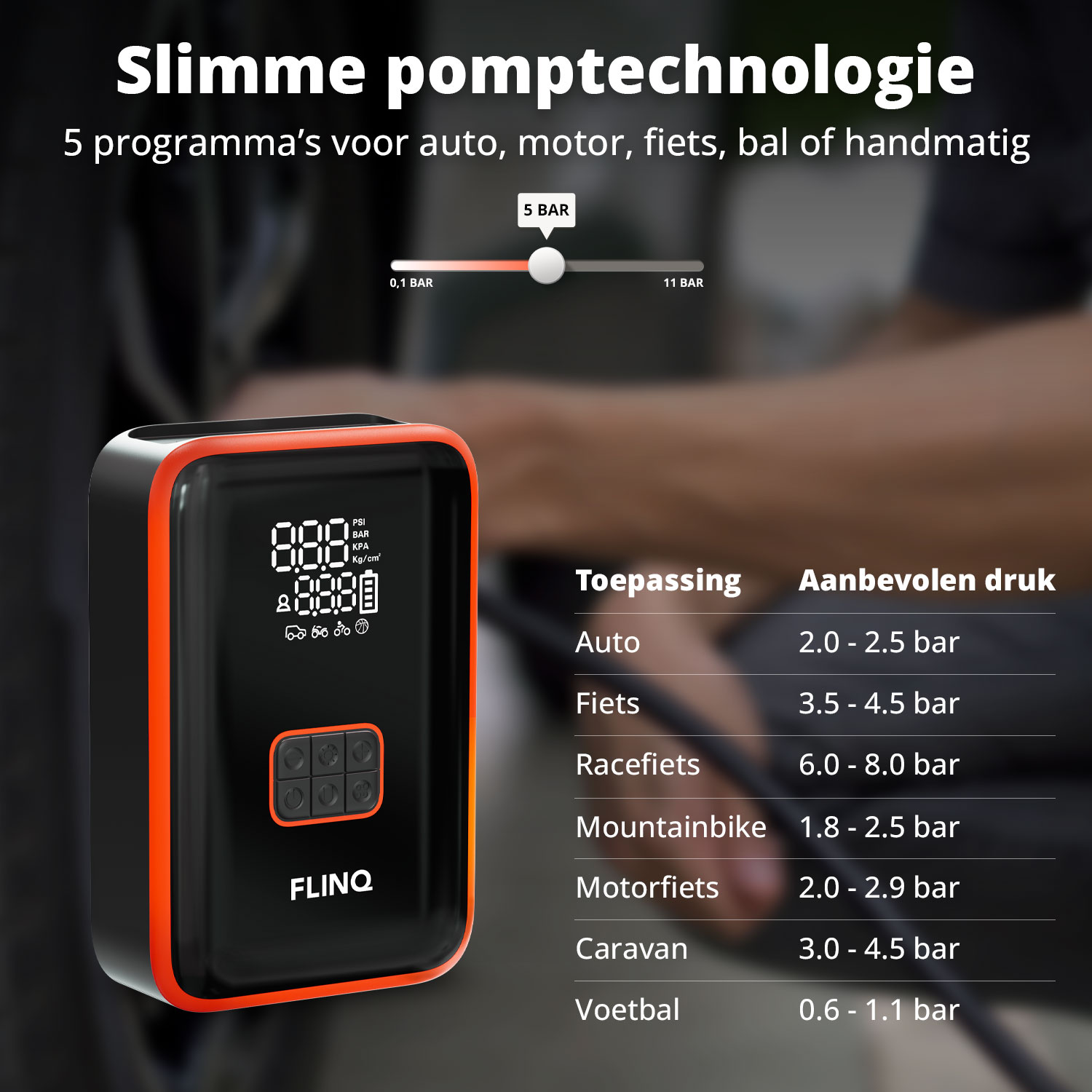 Black and orange air pump with a digital display, pressure settings, and a table showing recommended pressure for various vehicles.