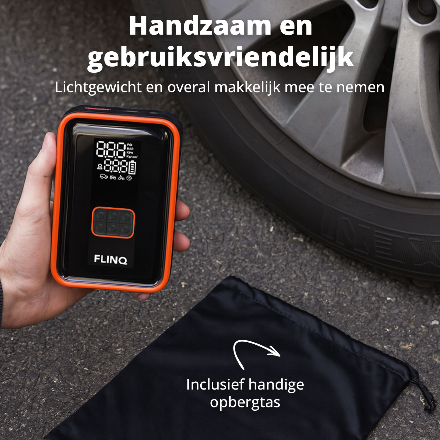 A person holds a black and orange FLINQ tire inflator. A car tire is in the background. A black bag is on the ground.