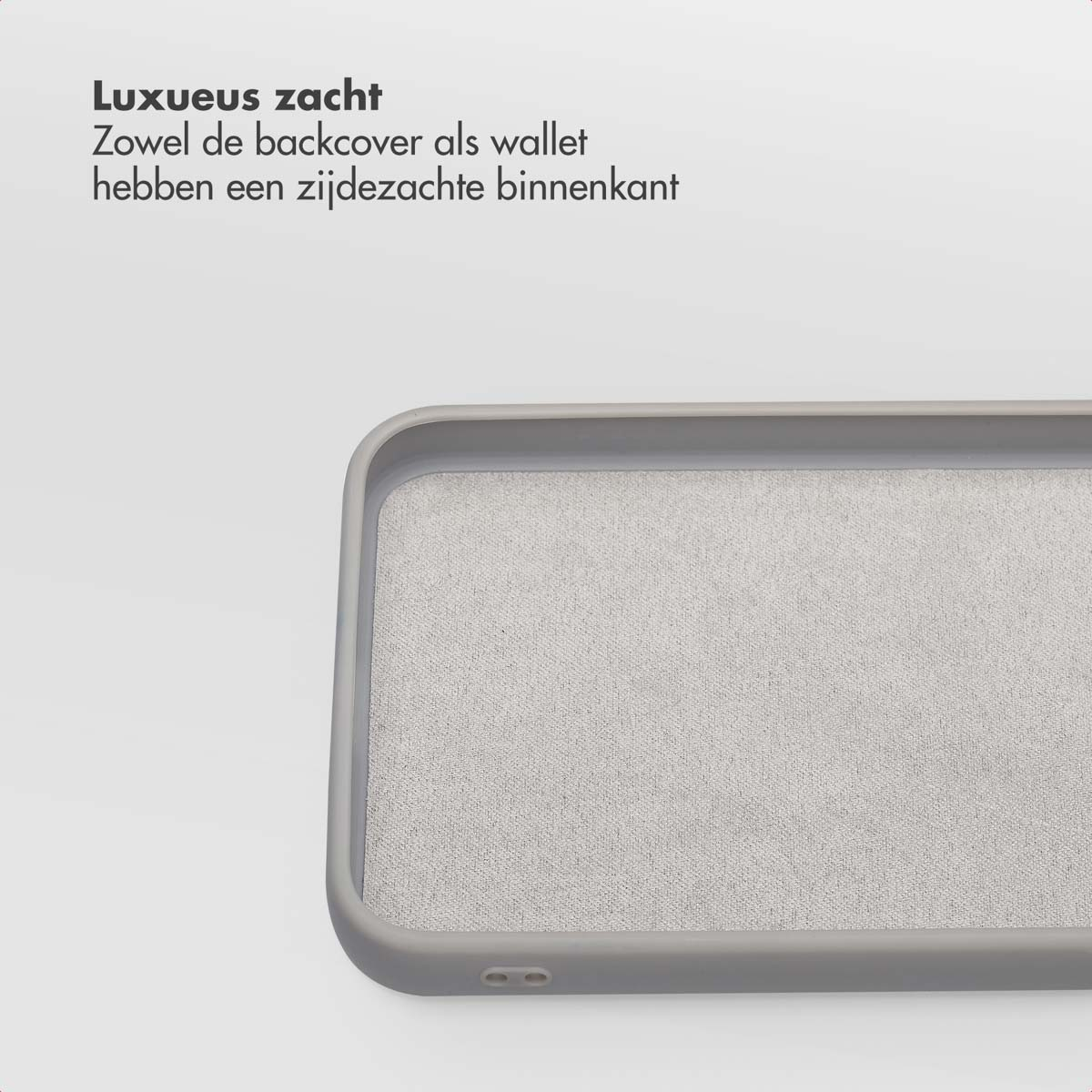 Een grijze telefoonhoes met een zacht, gestructureerd interieur. Nederlandse tekst beschrijft de hoes als luxueus en zacht.