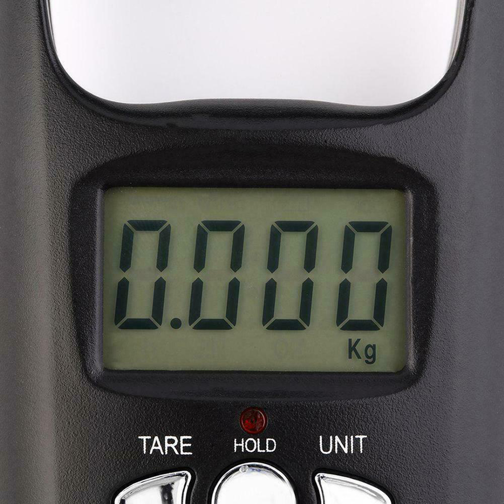 Digitale Waage zeigt 0,000 kg an. Das Gerät ist schwarz mit den Knöpfen TARE, HOLD und UNIT. Ein rotes Licht leuchtet.