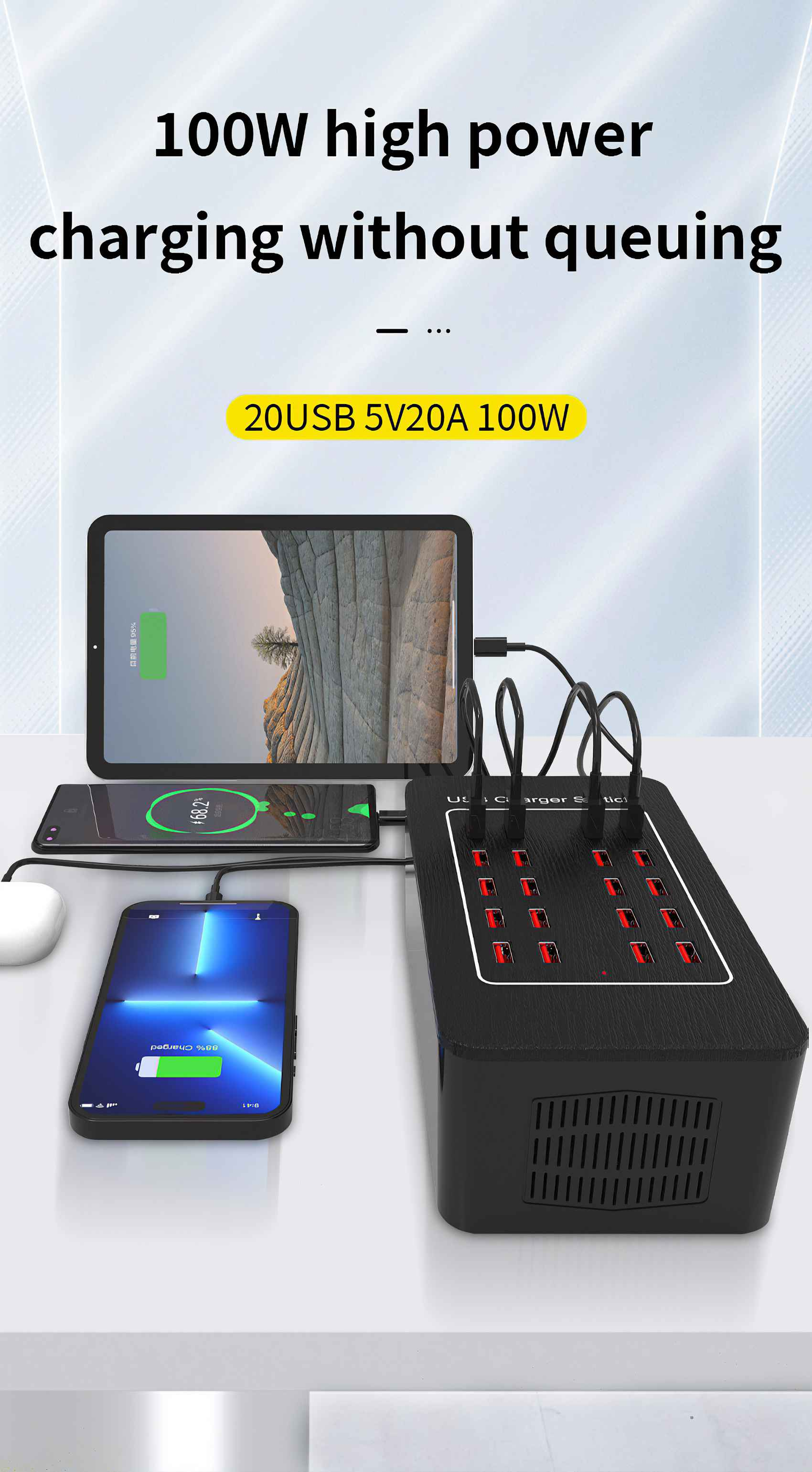 Eine schwarze Ladestation mit mehreren USB-Anschlüssen lädt Telefone und ein Tablet. Text: 100W hohe Leistung.