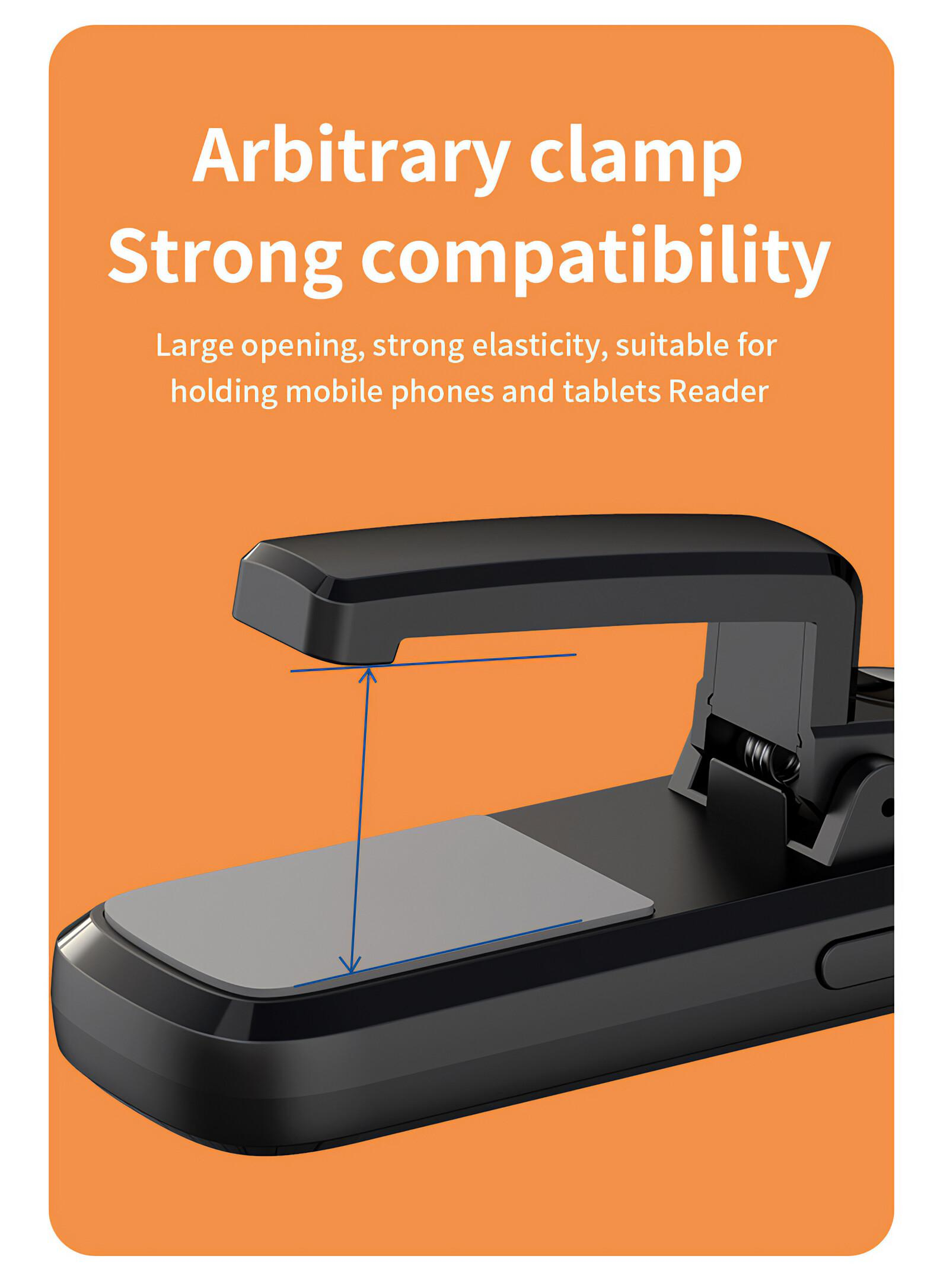 Schwarzer Telefonhalter mit Text 'Arbitrary clamp Strong compatibility' auf orangefarbenem Hintergrund. Ein graues Pad ist sichtbar.
