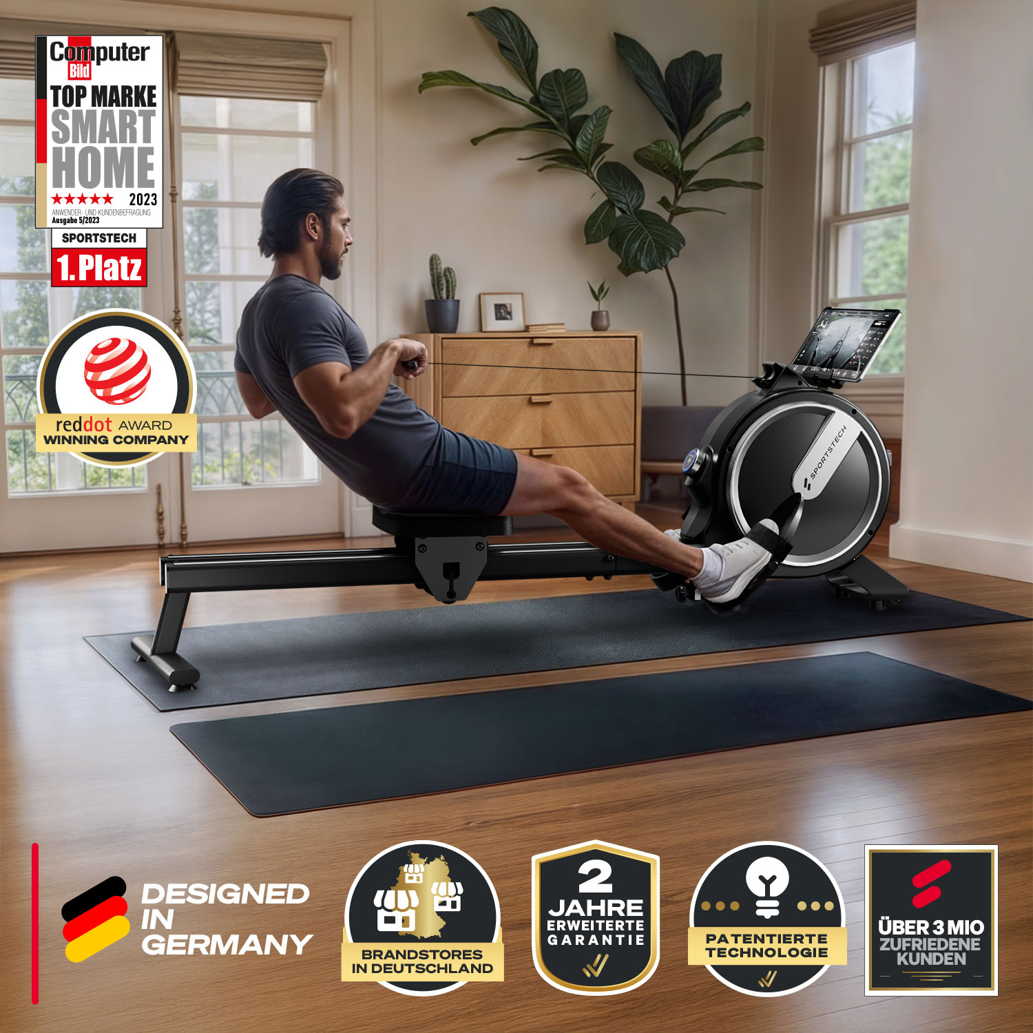 Ein Mann rudert auf einer schwarzen Sportstech-Maschine. Auszeichnungen und Logos sind sichtbar. Der Raum hat Holzmöbel und Pflanzen. Design in Deutschland.