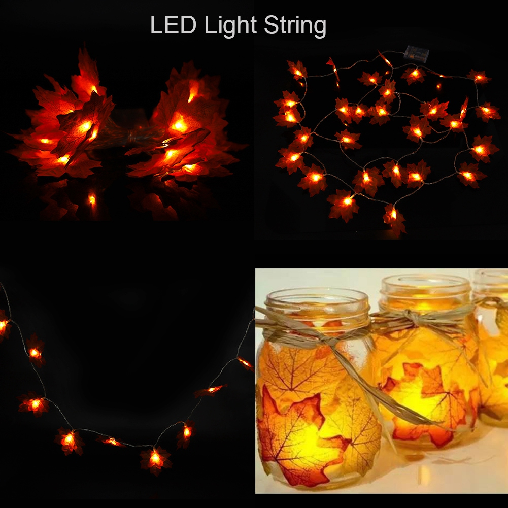 Das Bild zeigt LED-Lichterketten in Blattform und beleuchtete Einmachgläser. Die Blätter und Lichter sind orange und gelb.