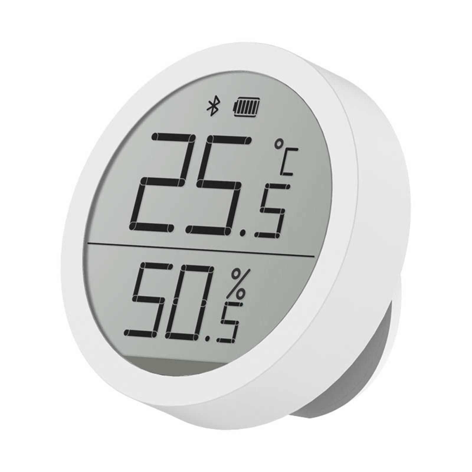 Weißes Digitaldisplay zeigt 25,5 über 50,5 %. Bluetooth-, Akku-Symbole. Weißer Rand auf grauem Bildschirm und weißes Außengehäuse.