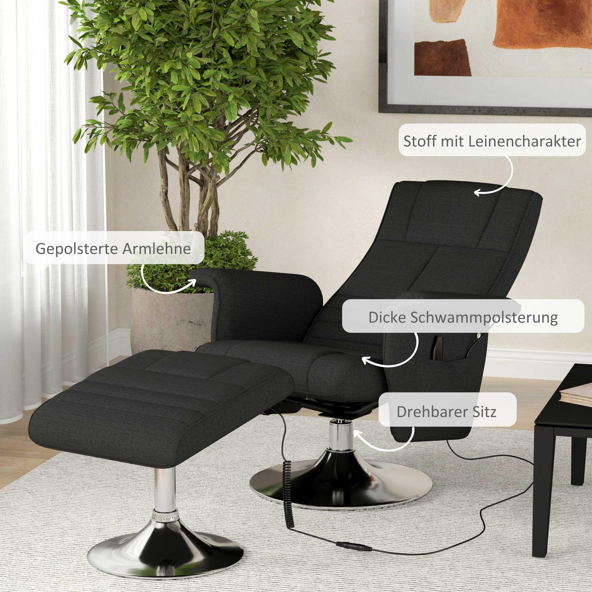 Ein schwarzer Relaxsessel mit Fußstütze auf einem hellen Teppich, neben einer Topfpflanze, in einem Raum mit einem Gemälde und einem kleinen Tisch.