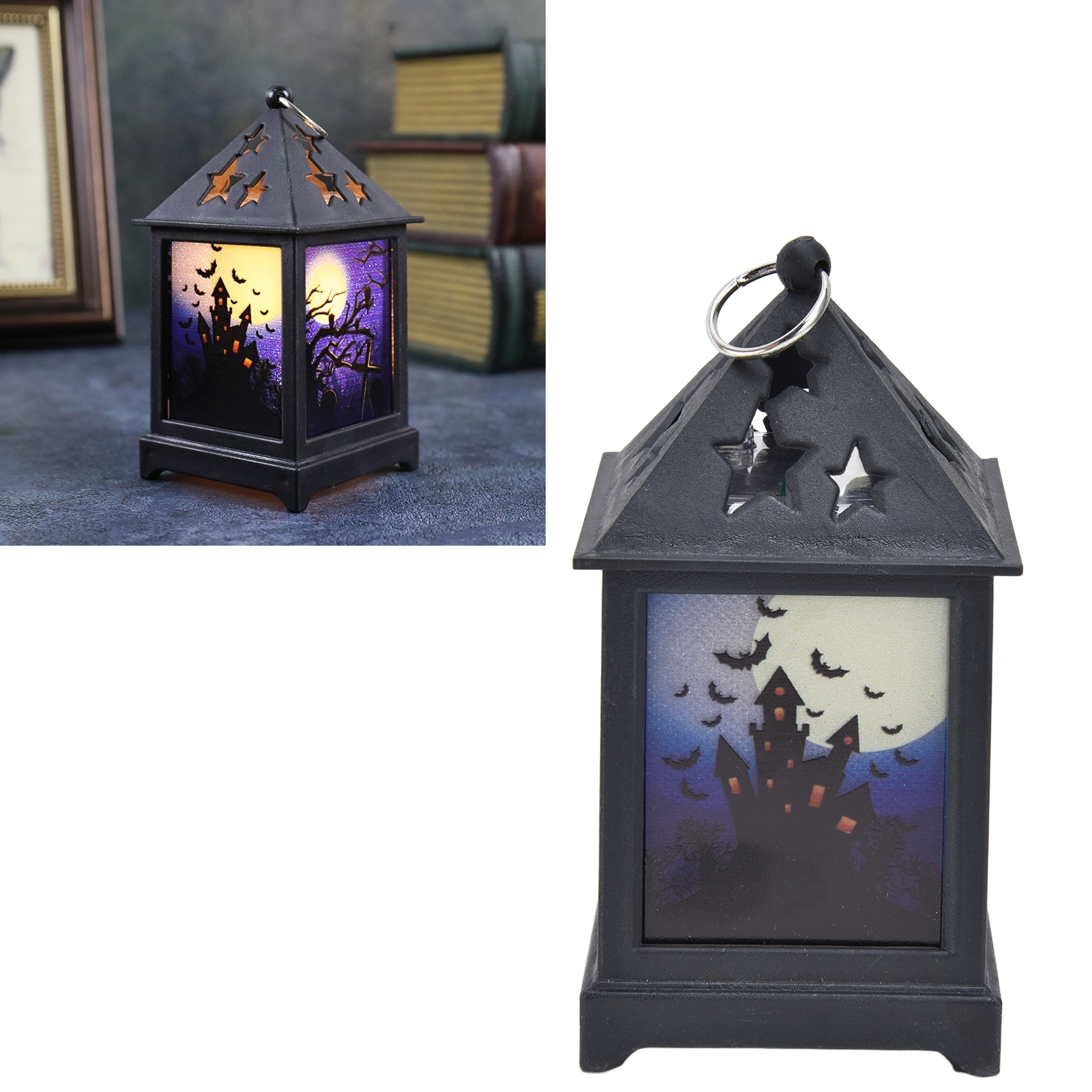 Schwarze Halloween-Laterne mit einer Spukhausszene. Fledermäuse fliegen vor einem Vollmond. Sterne sind oben ausgeschnitten.