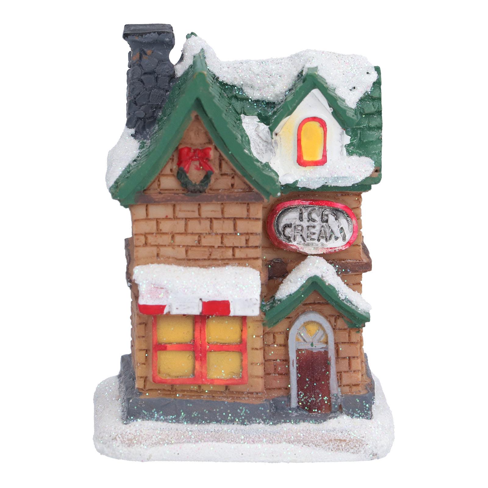 Ein Miniatur-Weihnachtshaus mit Schnee, grünem Dach und einem Schild mit der Aufschrift 'EISCREME'.