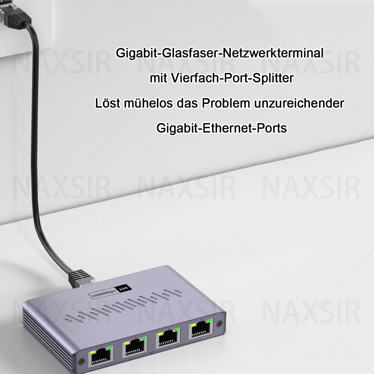 Ein silbernes Netzwerkterminal mit vier Anschlüssen, das mit einem schwarzen Kabel verbunden ist. Das Terminal befindet sich auf einer weißen Oberfläche.