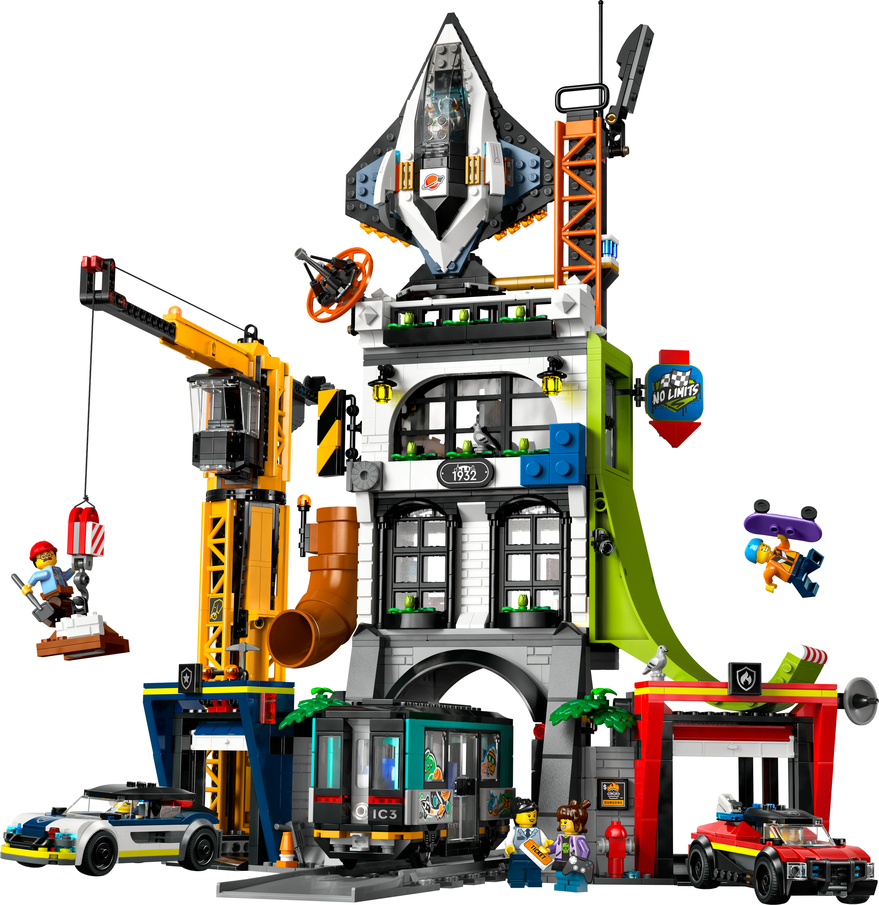 Bir Lego şehir seti, uzay gemisi, tren, polis arabası, itfaiye aracı, vinç ve figürlerle.