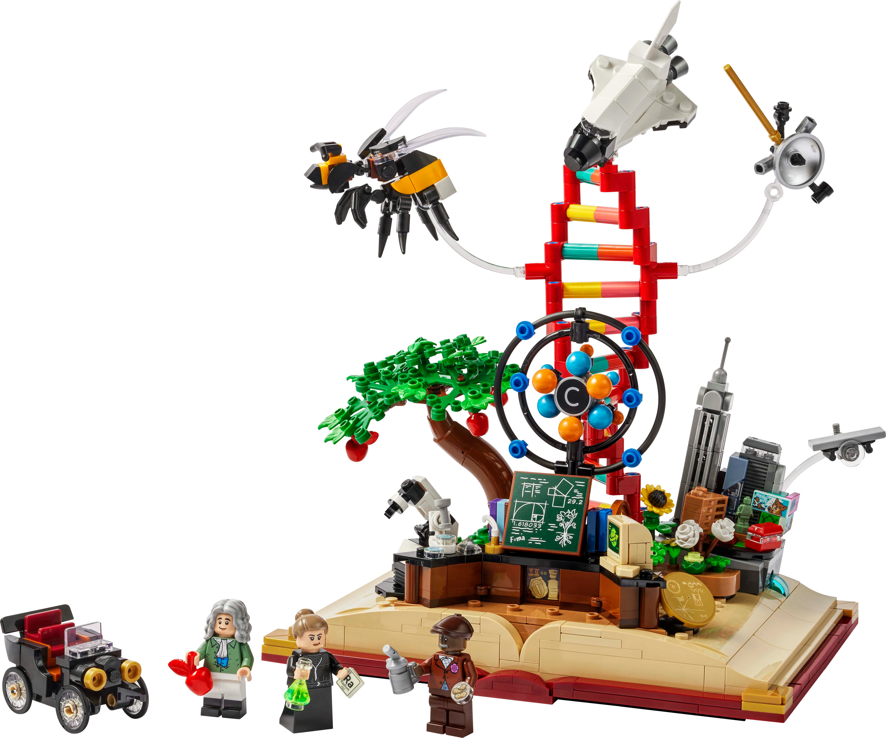LEGO seti bilim öğelerini gösteriyor: arı, DNA, uzay mekiği, araba, figürler ve açık bir kitap tabanında bir bina.