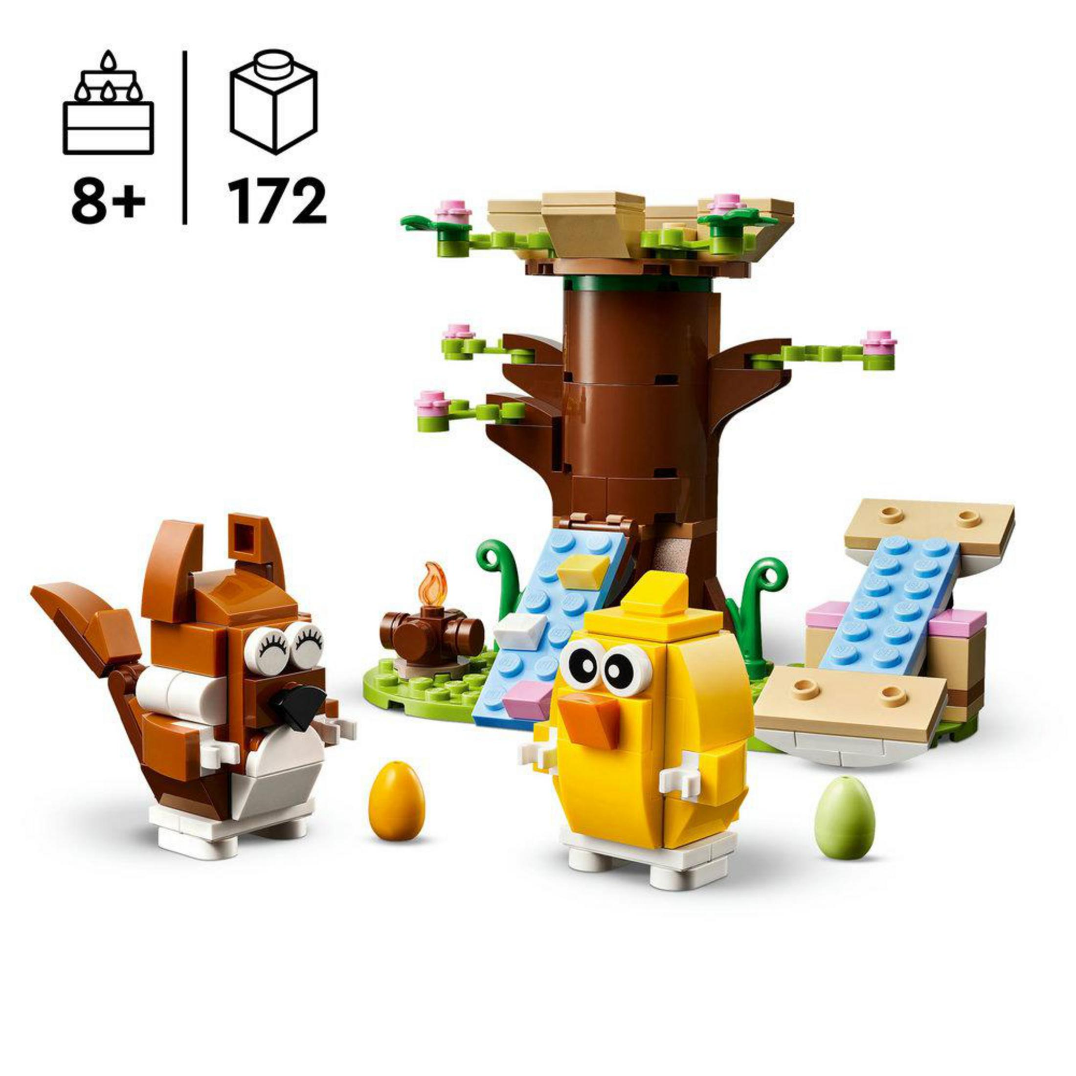 Bir ağaç, hayvanlar ve diğer öğeler içeren bir Lego seti. Bir köpek, bir civciv ve bir kamp ateşi içerir.