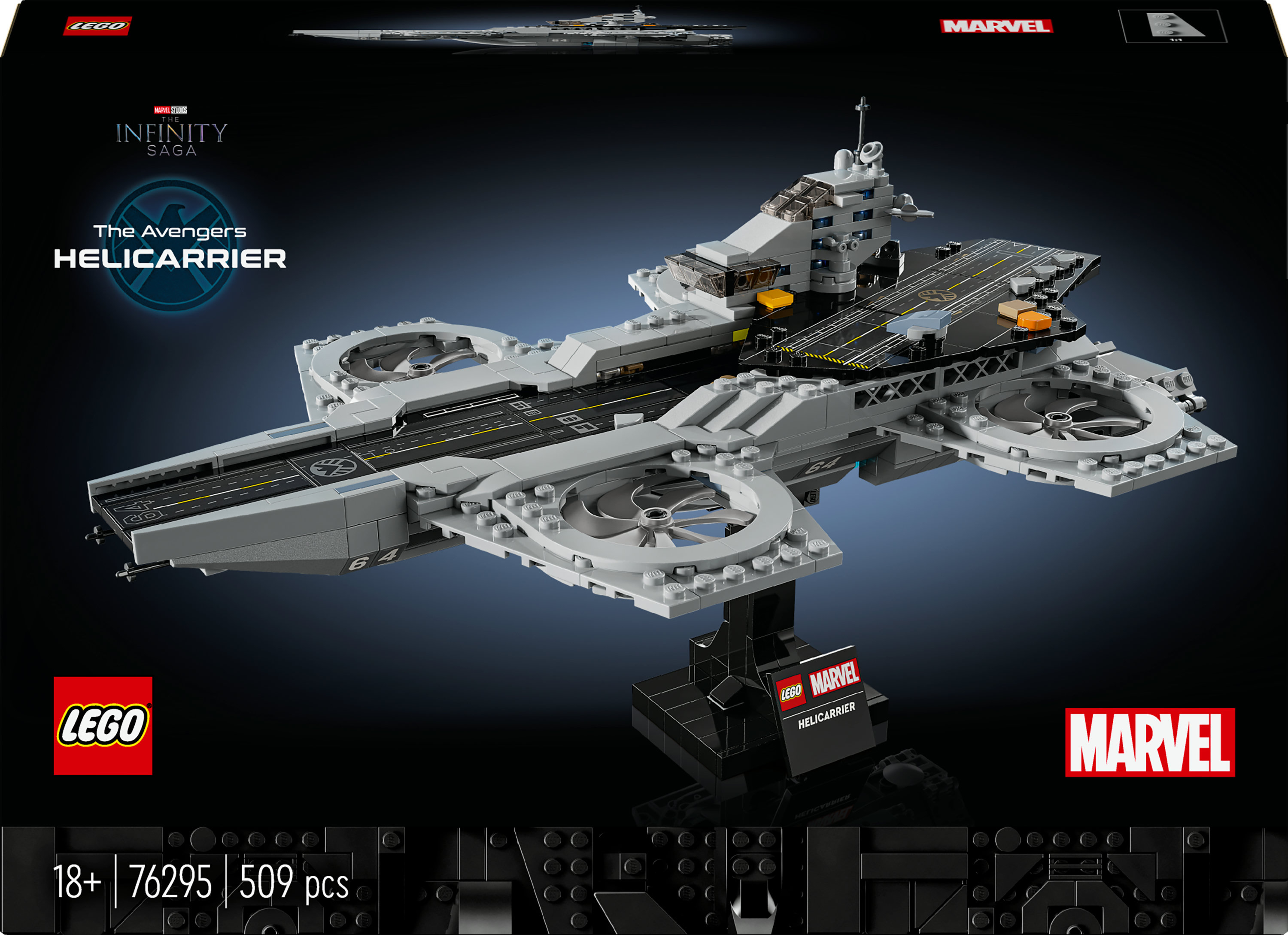Set Lego dell'Helicarrier degli Avengers. Modello grigio con area di atterraggio nera ed eliche. Loghi Marvel e Lego visibili.