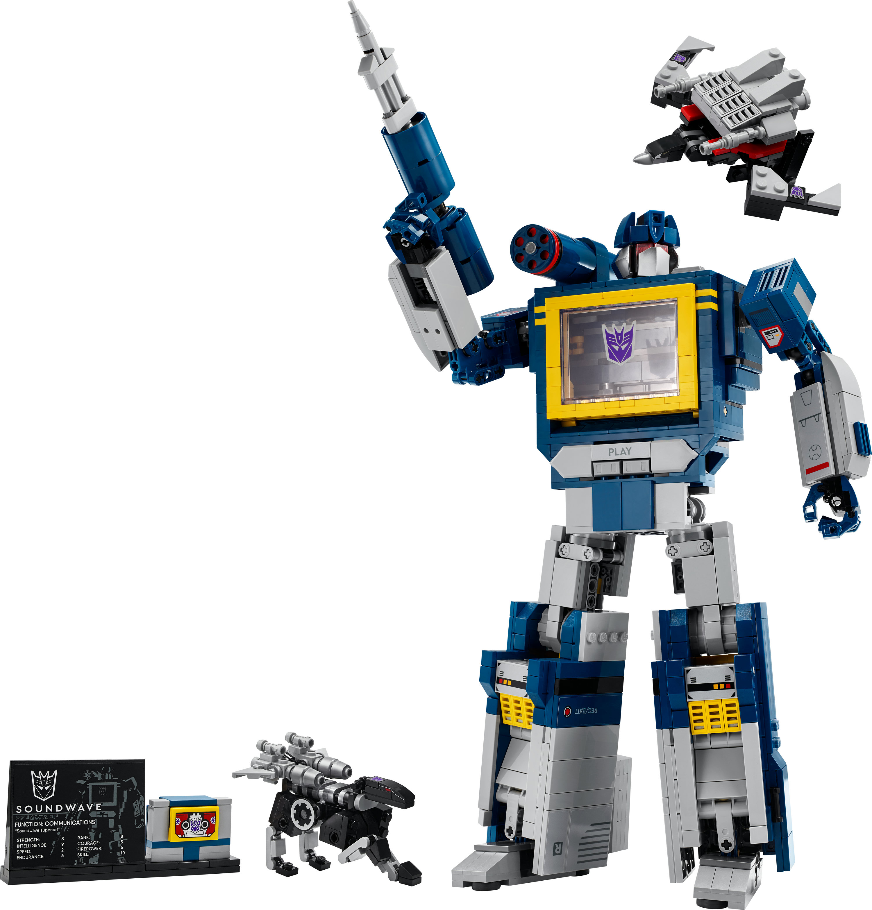Figurka robota Lego Soundwave z mniejszymi figurkami i znakiem, wszystko na białym tle. Dominują kolory niebieski, szary i żółty.