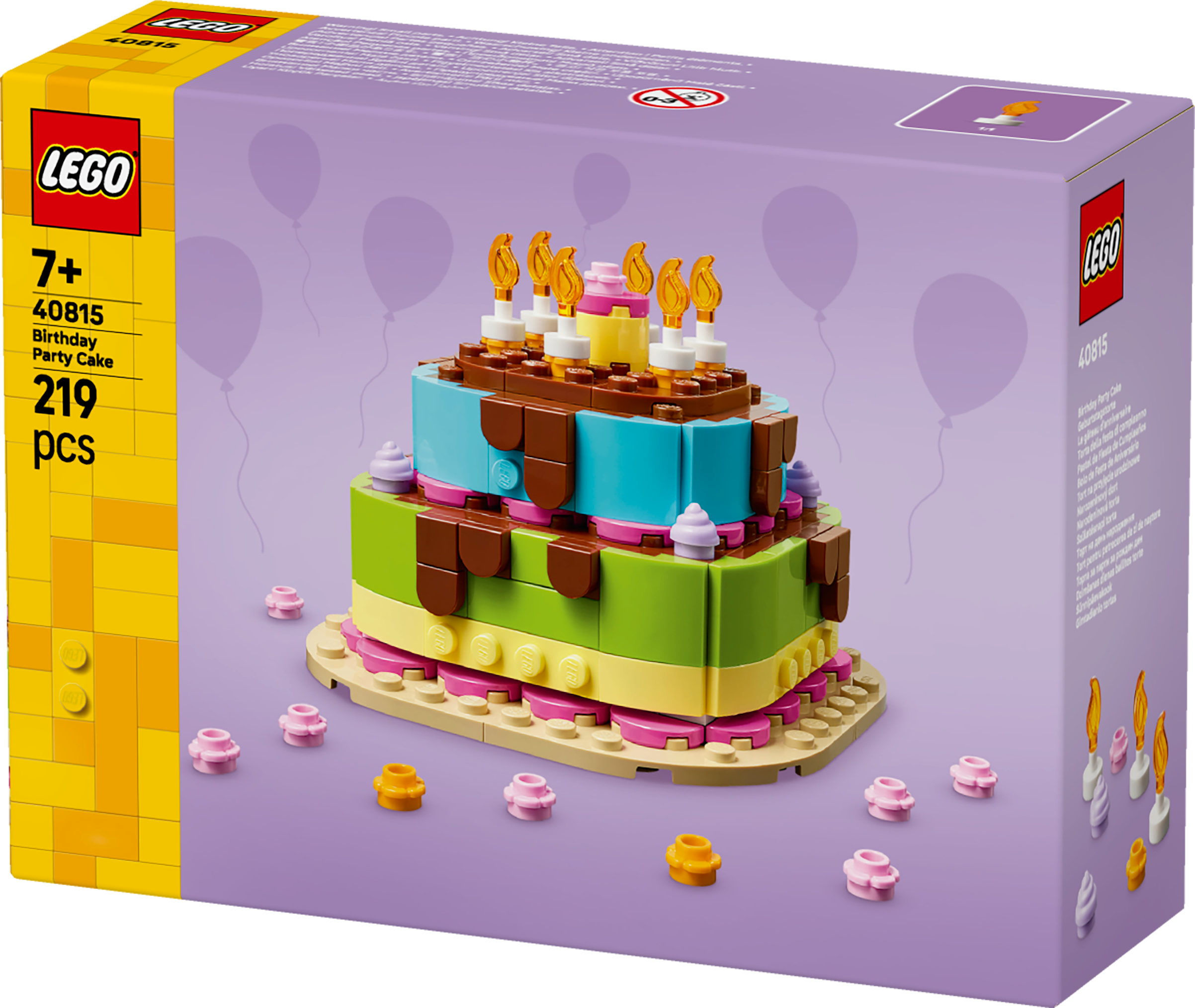 Set LEGO Torta di compleanno, la scatola mostra la torta con candele e decorazioni, con sfondo viola.
