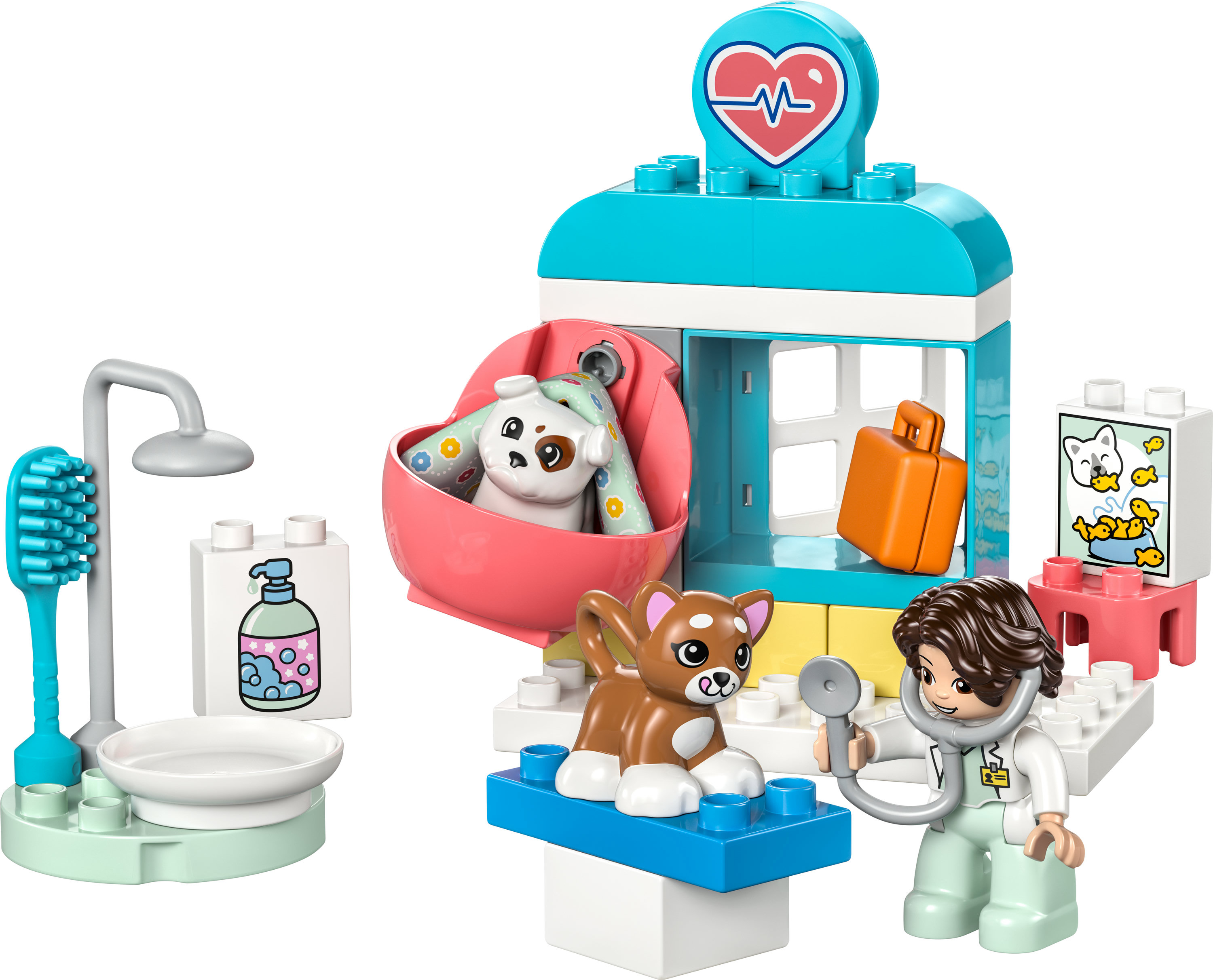 Een dierenartsset met een dierenarts, een hond en een pup die onderzocht wordt. Er is ook een douche en een verzorgingsstation.