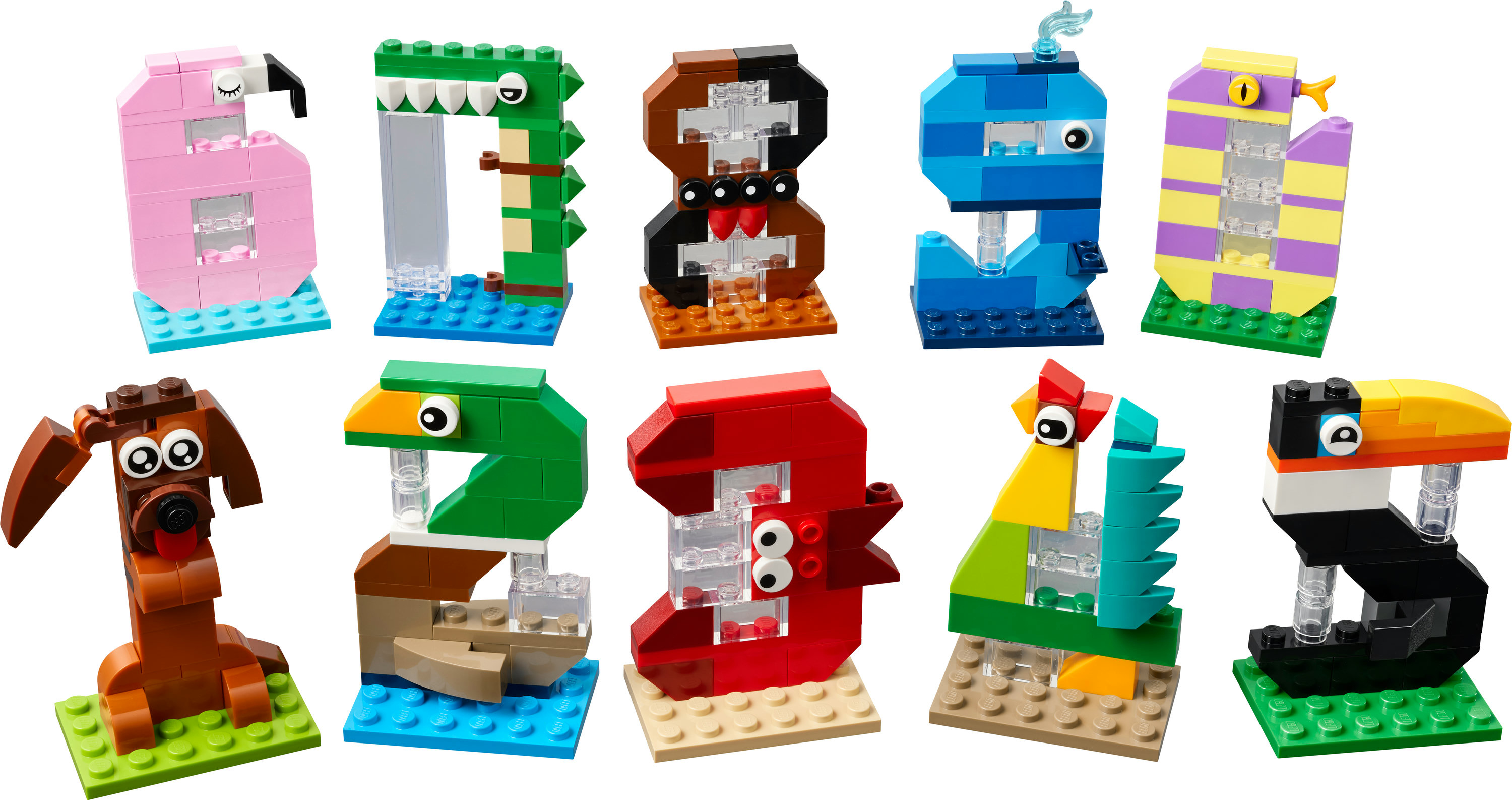 Bir koleksiyon Lego hayvan figürü, bir flamingo, timsah, dinozor, yılan, köpek, papağan, tukan ve diğerleri dahil, hepsi renkli tuğlalardan yapılmış.