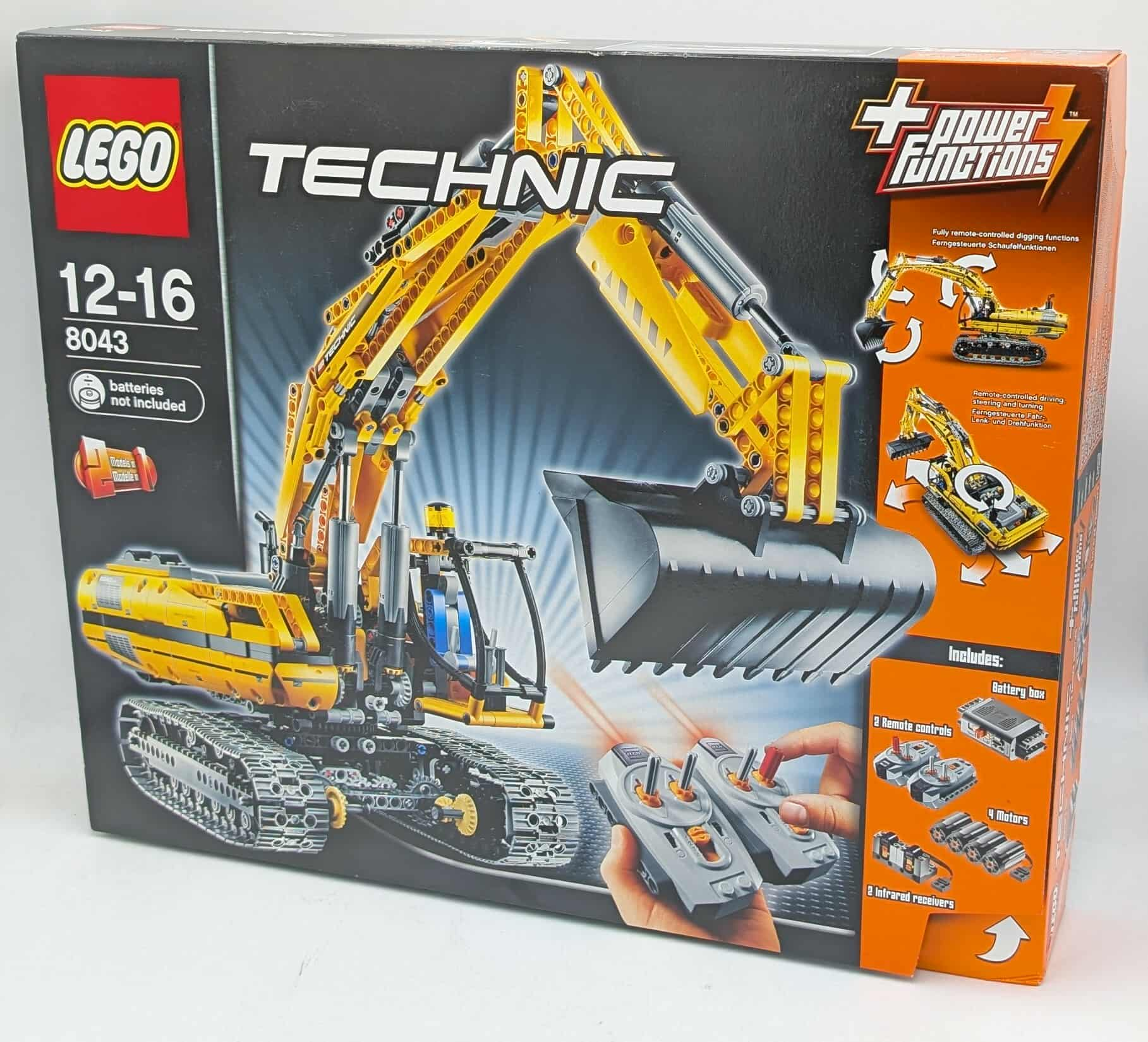 LEGO Technic graafmachine doos. Gele en zwarte kleuren. Inclusief afstandsbedieningen, motoren en batterijbox. Leeftijd 12-16.
