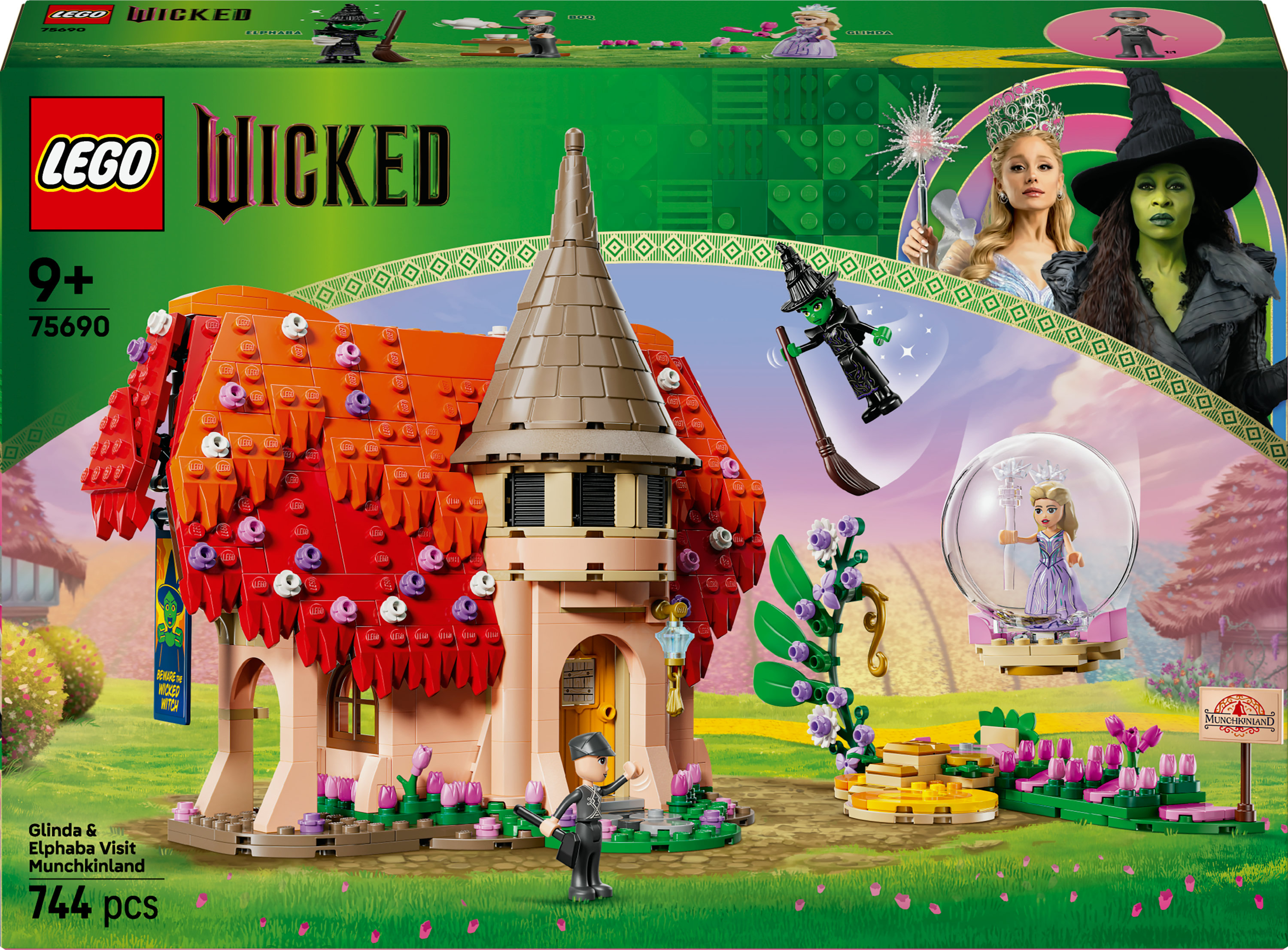 Eine LEGO Wicked-Set-Box. Sie zeigt ein Haus, Figuren und das Wicked-Logo. Die Szene hat einen grünen Rasenhintergrund.