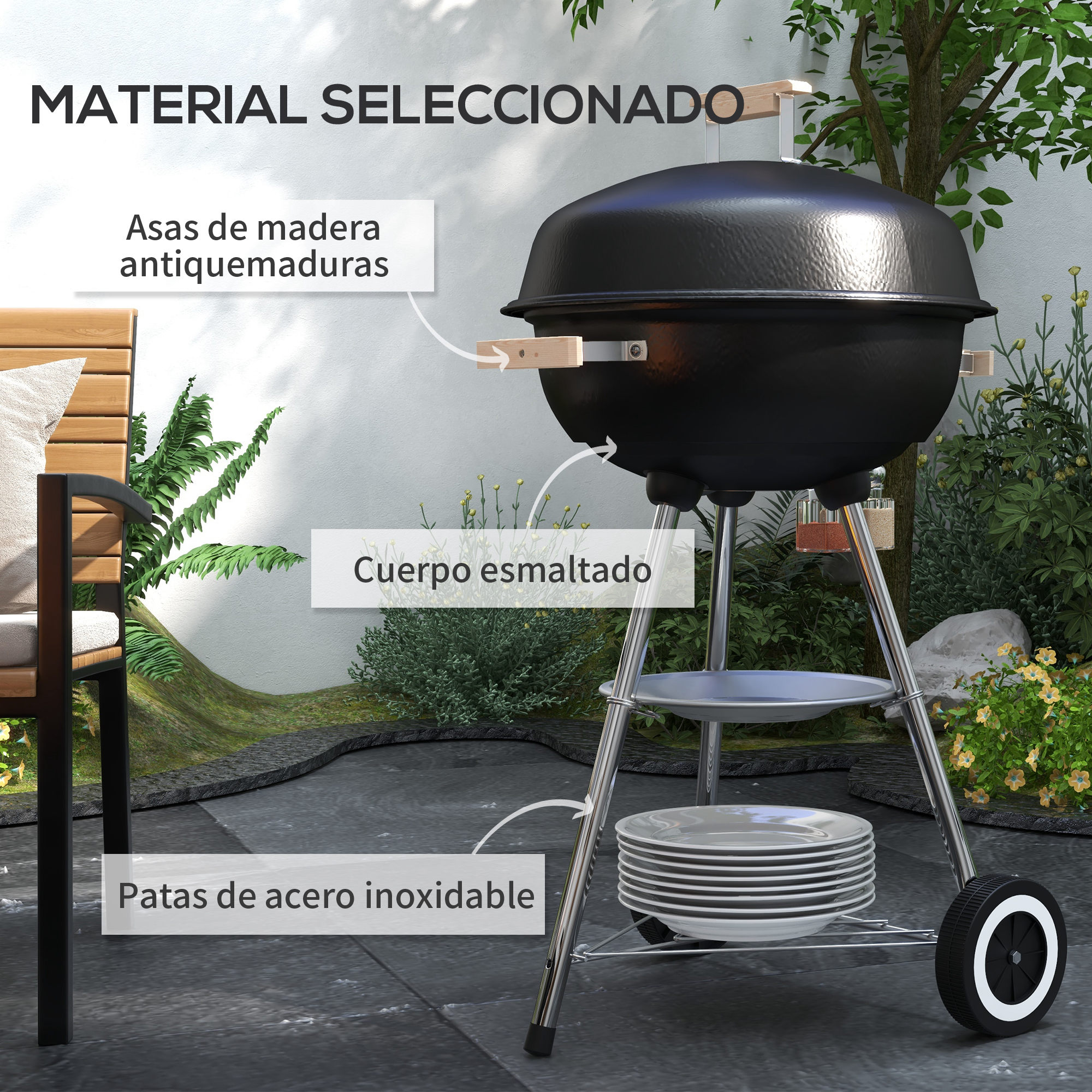 Una parrilla negra con mangos de madera, patas de acero inoxidable y una rueda. Tiene platos y está en un jardín.
