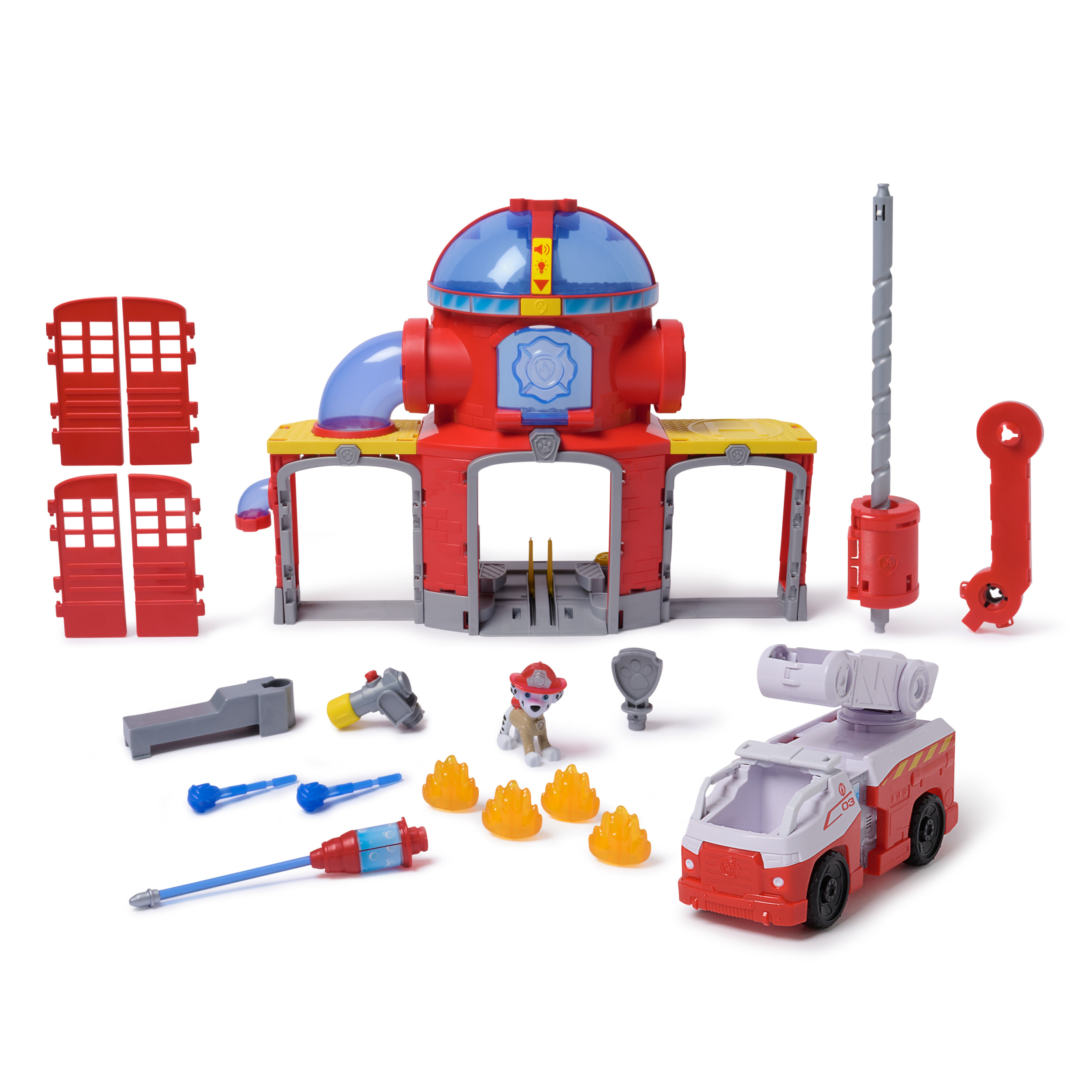 Zestaw zabawek straży pożarnej Paw Patrol. Zawiera wóz strażacki, figurkę Marshalla, budynek stacji i akcesoria.