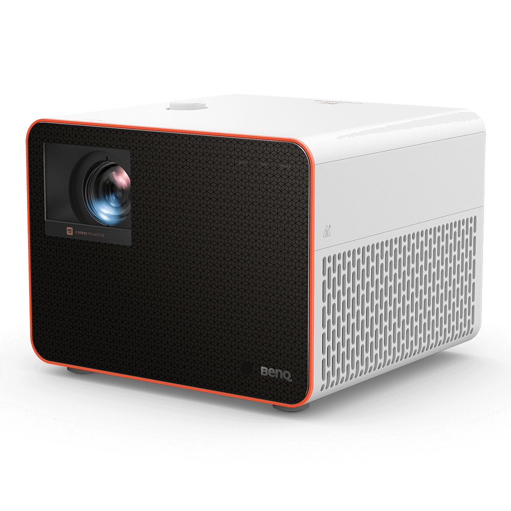 Un proyector blanco con frente negro estampado y borde naranja. La lente está al frente y la marca BenQ es visible.