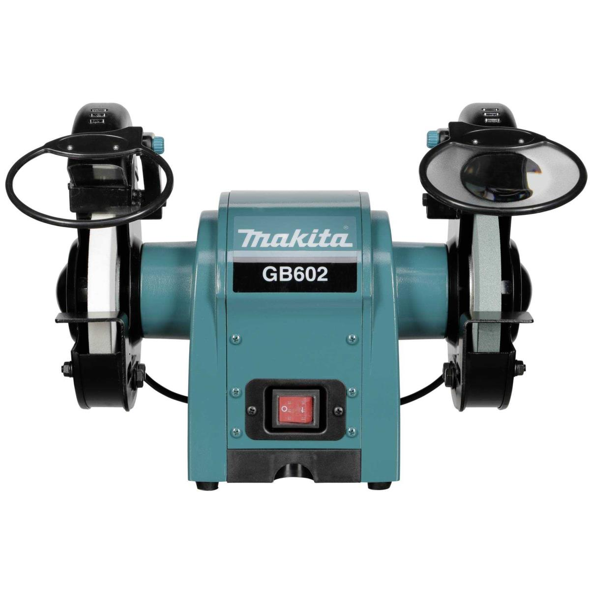 A teal Makita GB602 bench grinder. It has two grinding wheels, a red power switch, and protective shields.