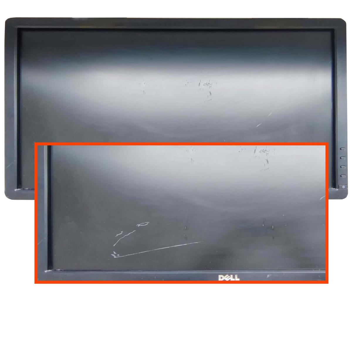 Un monitor Dell nero con graffi. Lo schermo presenta segni visibili. Il logo Dell è in basso. La cornice del monitor è nera.