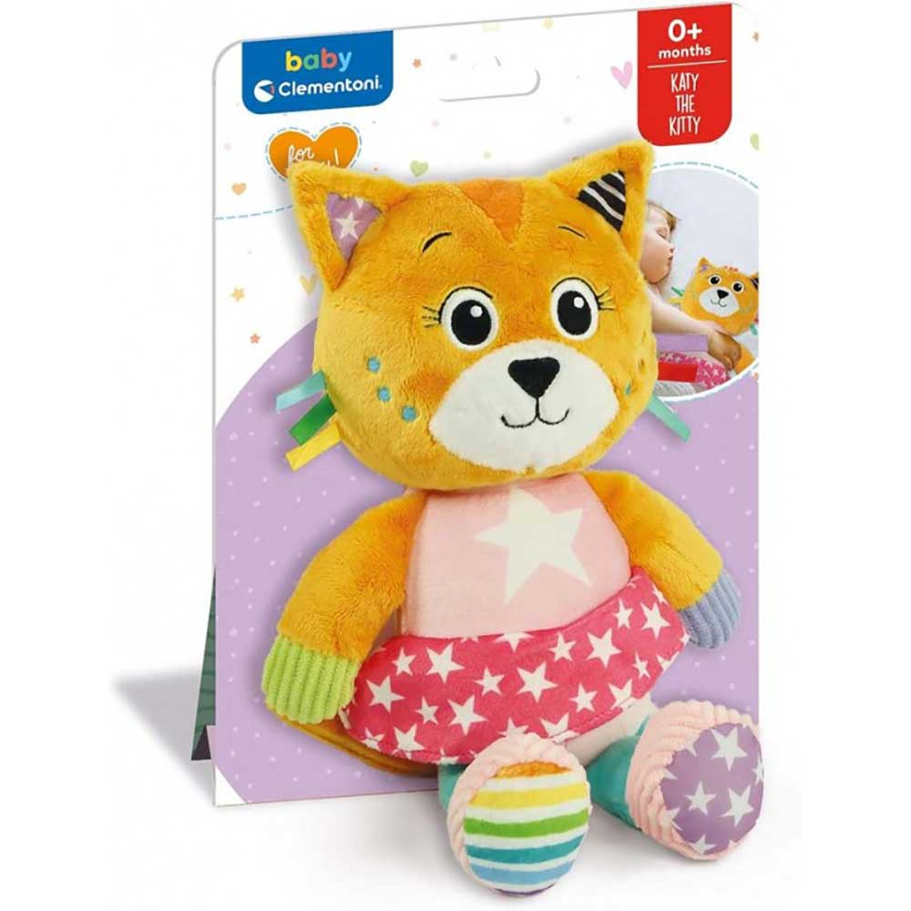Un giocattolo a forma di gatto di peluche con pelliccia arancione, un vestito rosa con stelle e una stella sul petto. È su una confezione 'Katy the Kitty'.