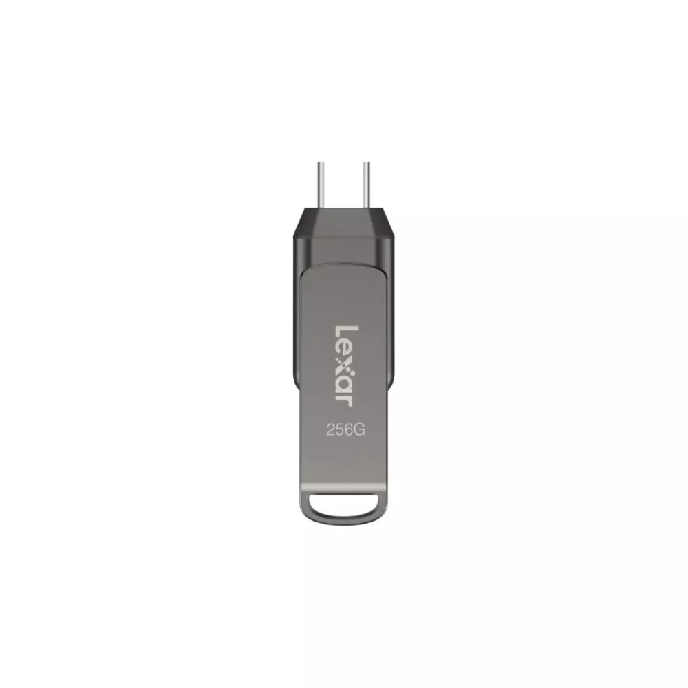 Srebrny pendrive Lexar 256G jest umieszczony pionowo pośrodku. Ma prostokątny korpus z dwoma metalowymi bolcami u góry.