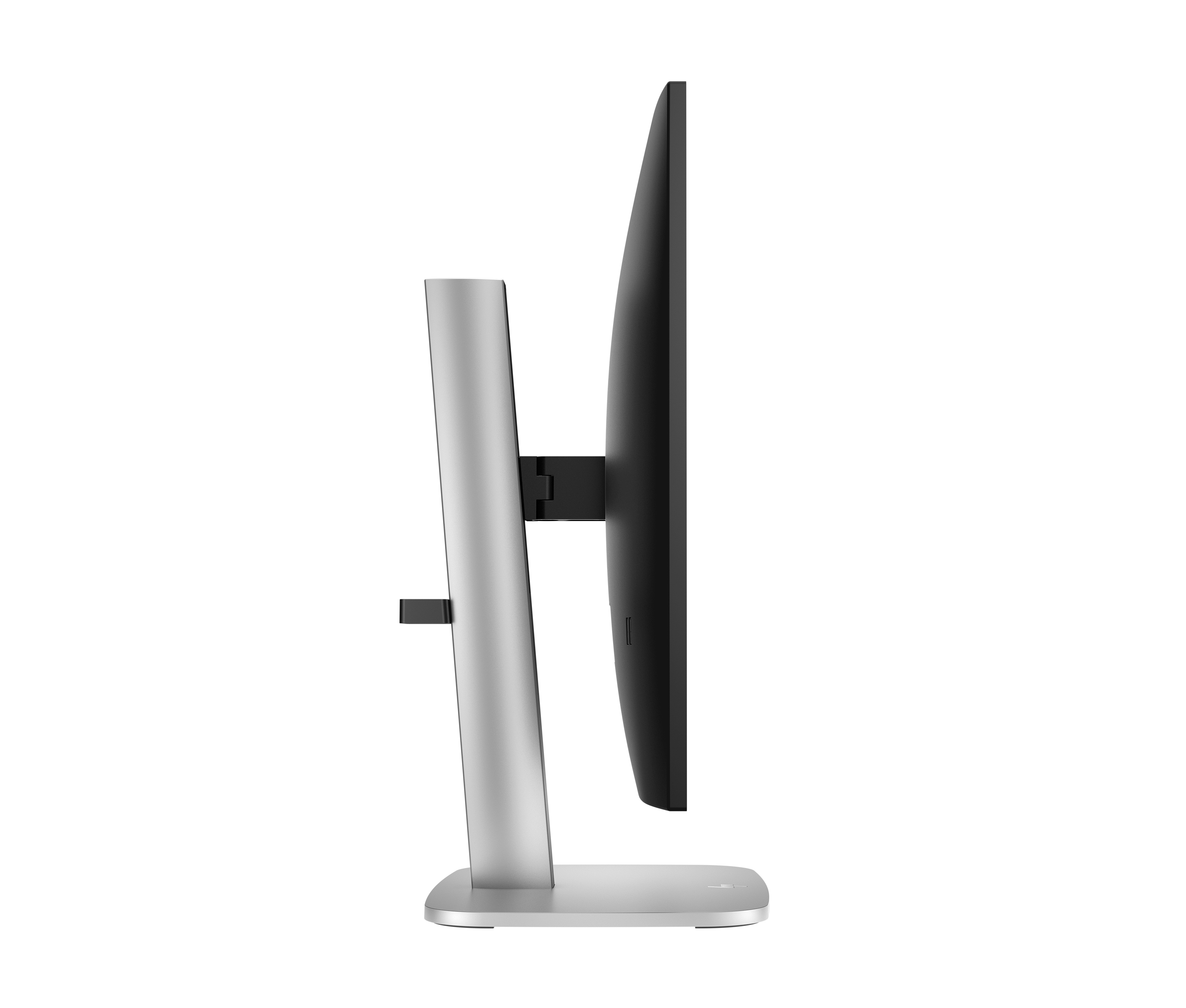 Widok z boku monitora komputera. Ma czarny ekran i srebrną podstawę na białym tle.