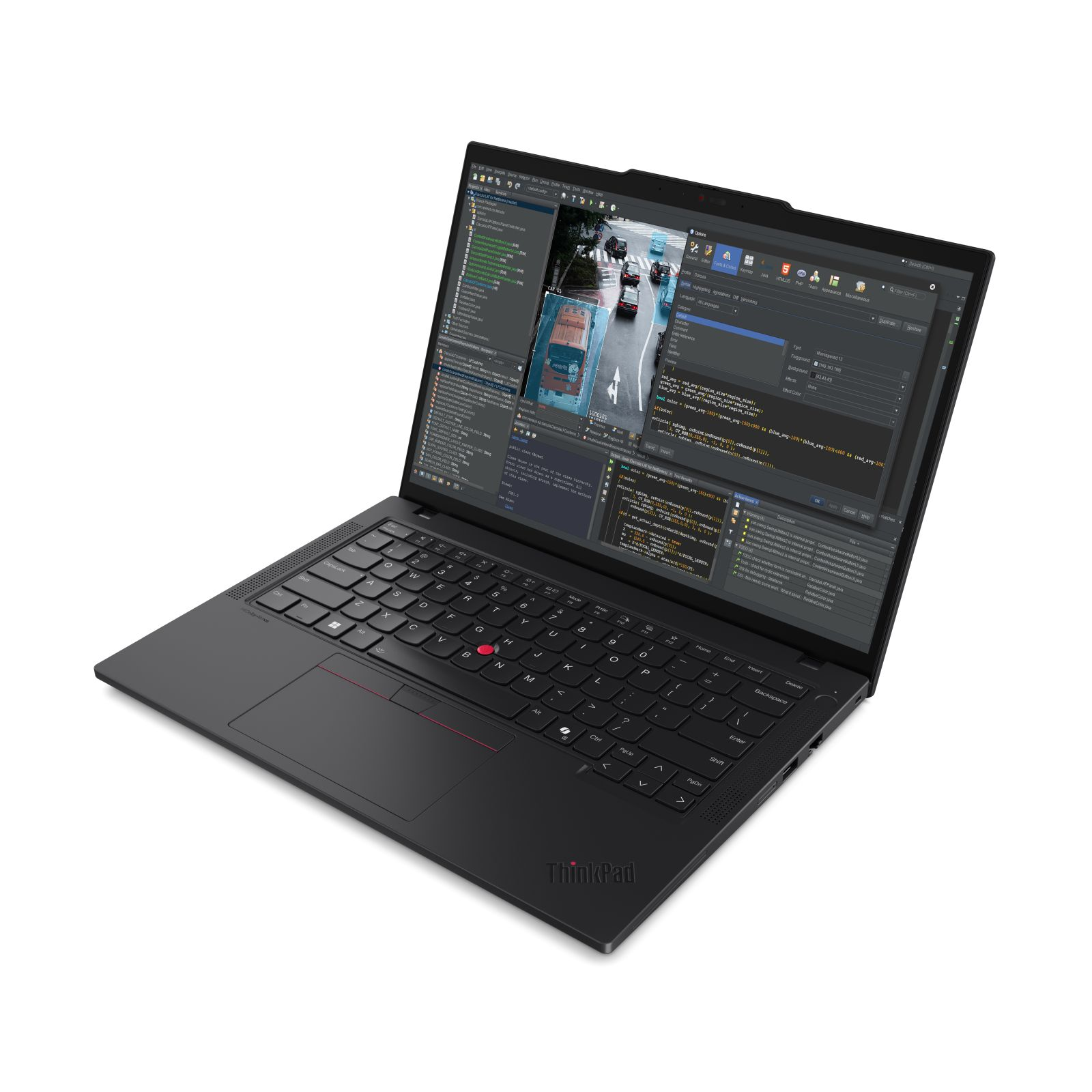 Czarny laptop ThinkPad z kodem i sceną uliczną. Widoczna klawiatura, gładzik z czerwonym przyciskiem.