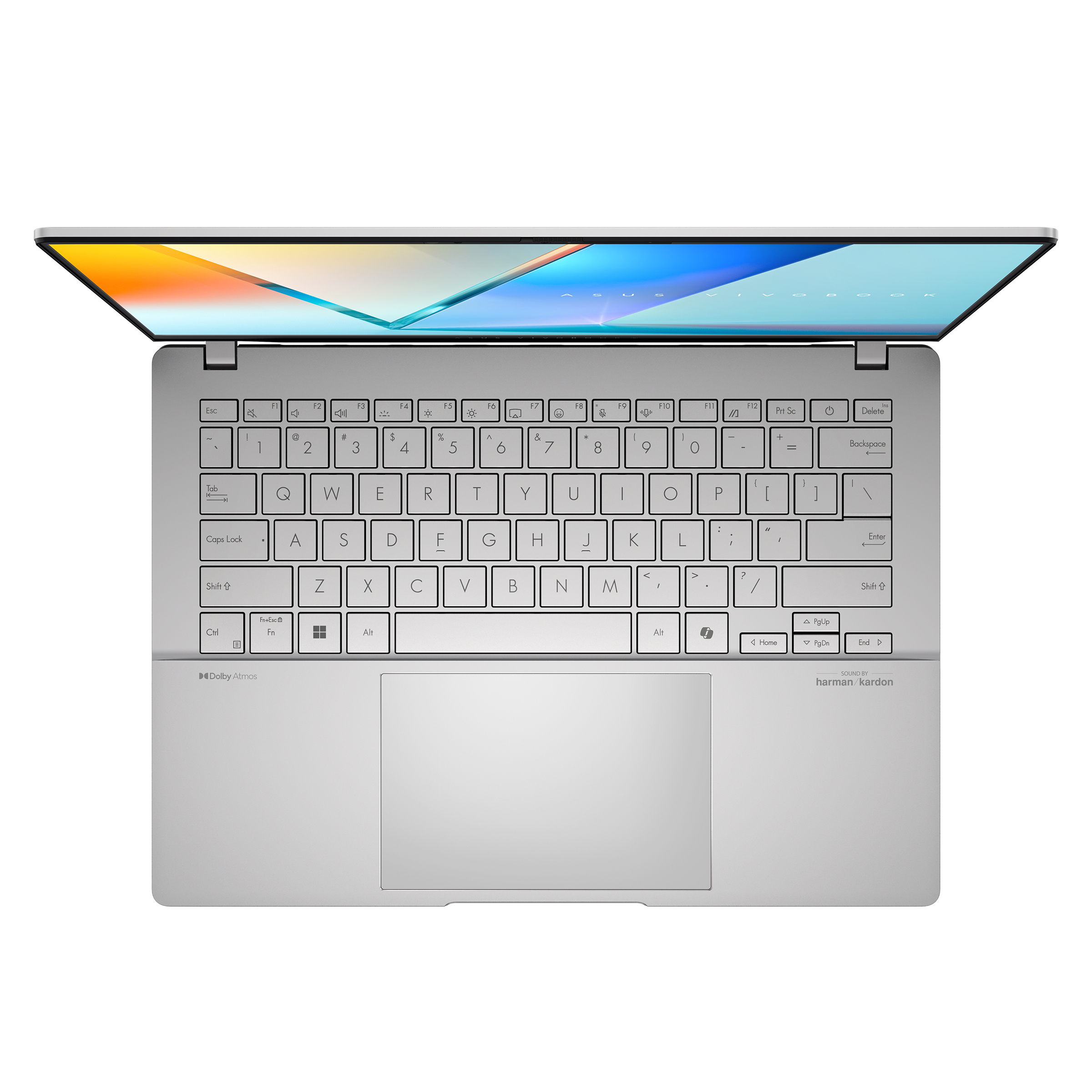 Un laptop argentato è aperto, mostra tastiera e schermo. Lo schermo visualizza un'immagine colorata.