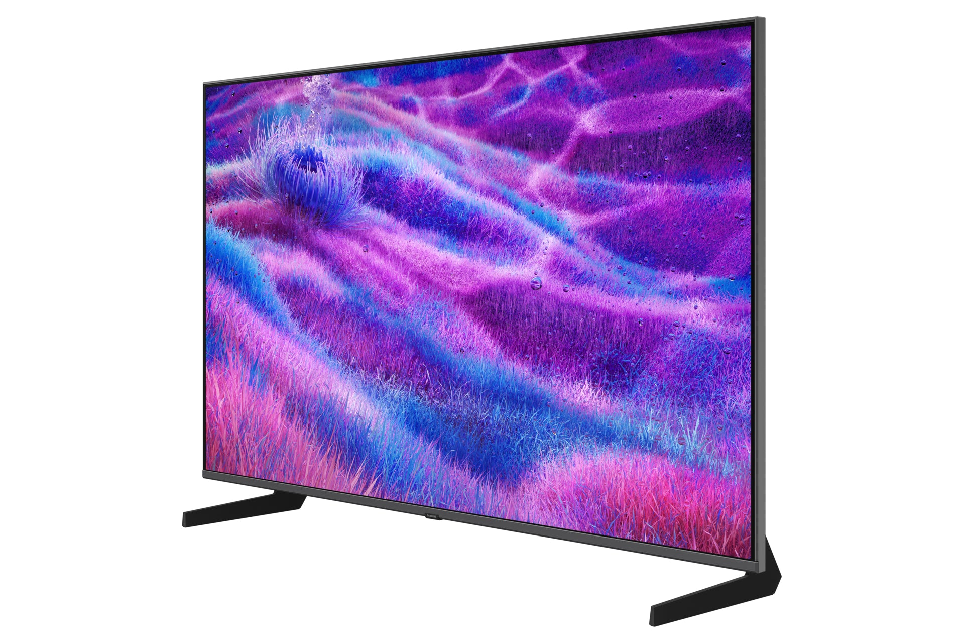 A large TV displays a colorful, abstract landscape with purple, blue, and pink tones. It stands on black legs against a white background.