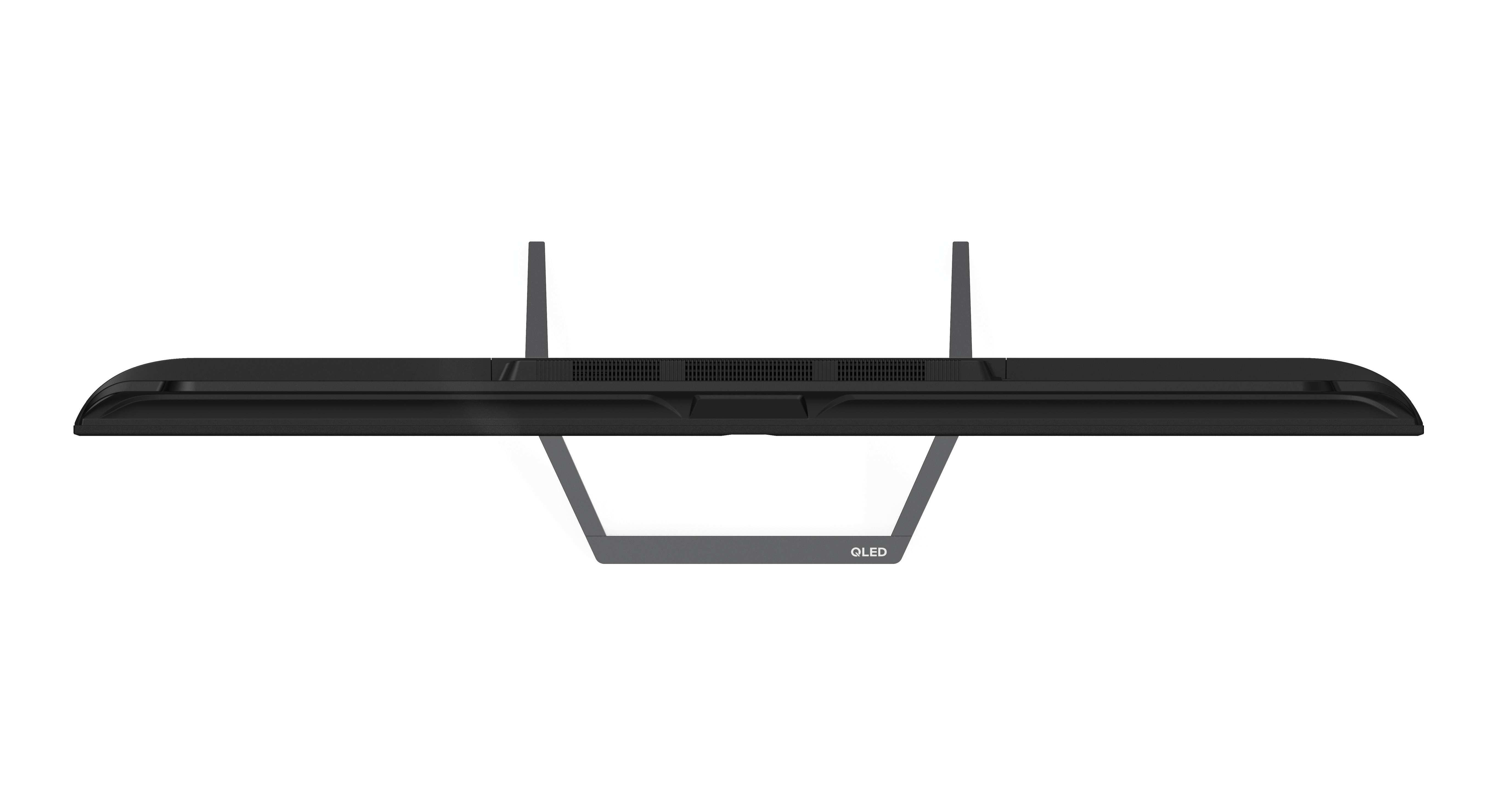 Un televisor OLED negro desde una vista superior. Tiene dos patas y un soporte. La palabra OLED es visible.