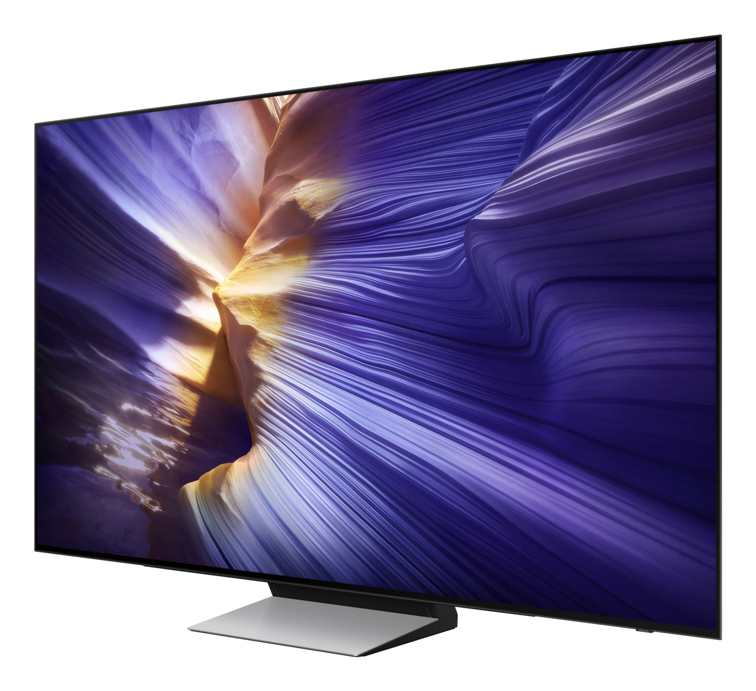 A sleek, modern TV displays a vibrant, abstract image of flowing purple and orange hues, mounted on a silver stand.
