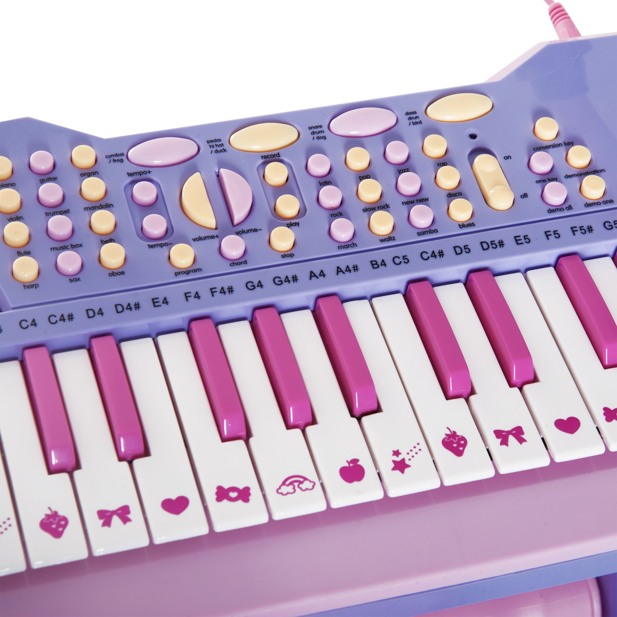Un piano de juguete morado y rosa. Tiene teclas blancas con detalles rosas y botones para diferentes sonidos y ritmos.