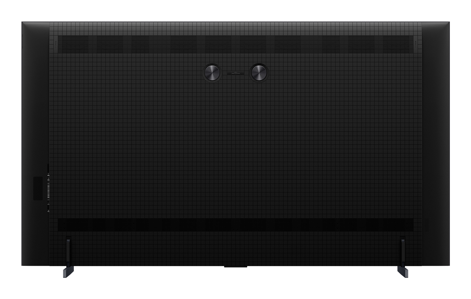 Widok z tyłu dużego czarnego telewizora. Ma teksturowaną powierzchnię. Widoczne są dwa okrągłe przyciski i kilka portów.