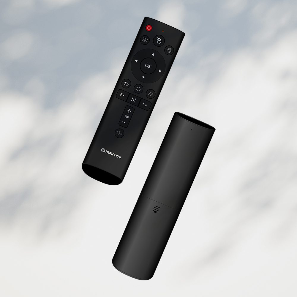 Dwa czarne piloty Manta unoszące się na tle pochmurnego nieba. Jeden ma przyciski, drugi to walec.