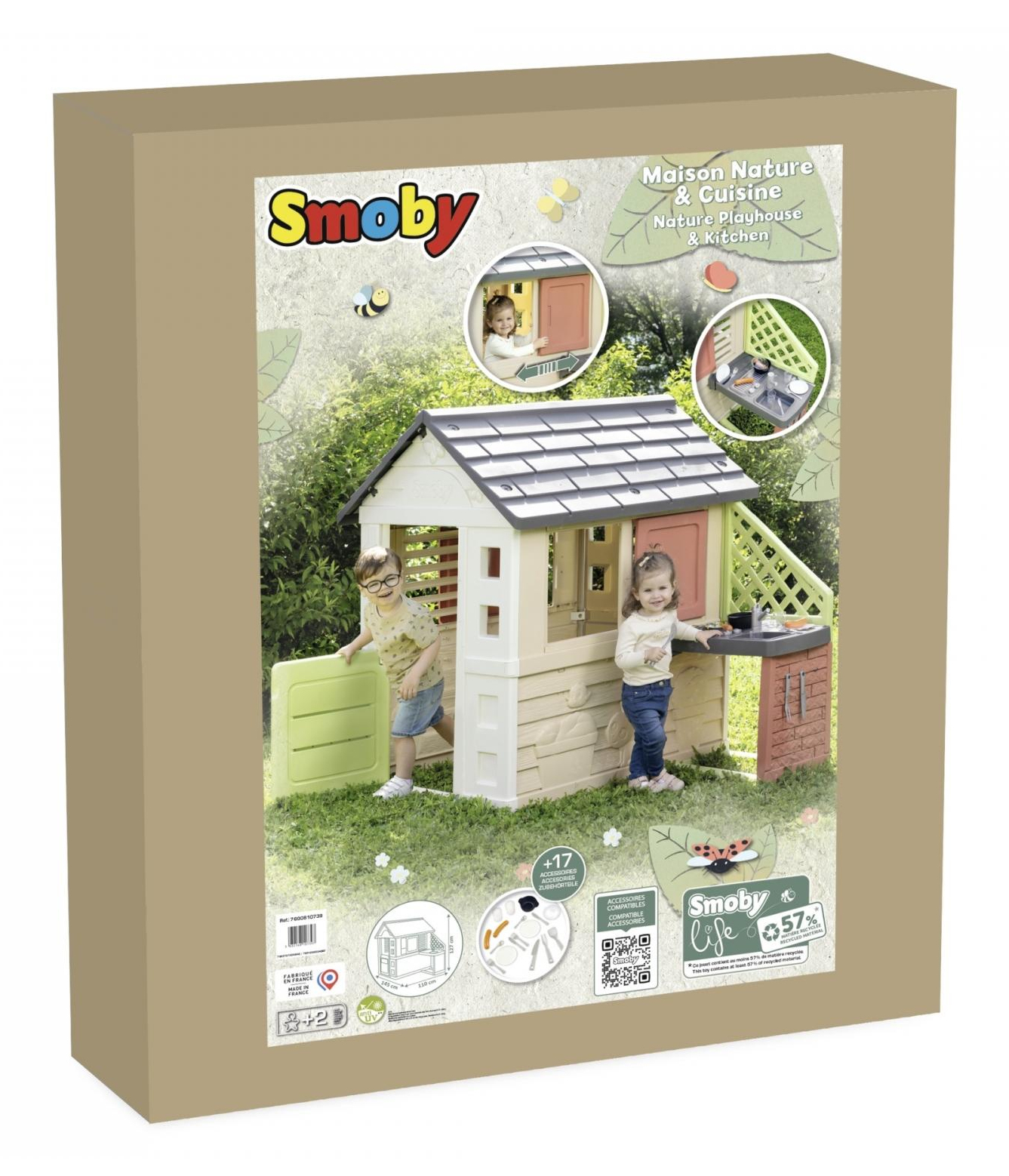 Karton mit Smoby Spielhaus und Küchenset. Kinder benutzen es. Die Box hat Marken- und Produktdetails.