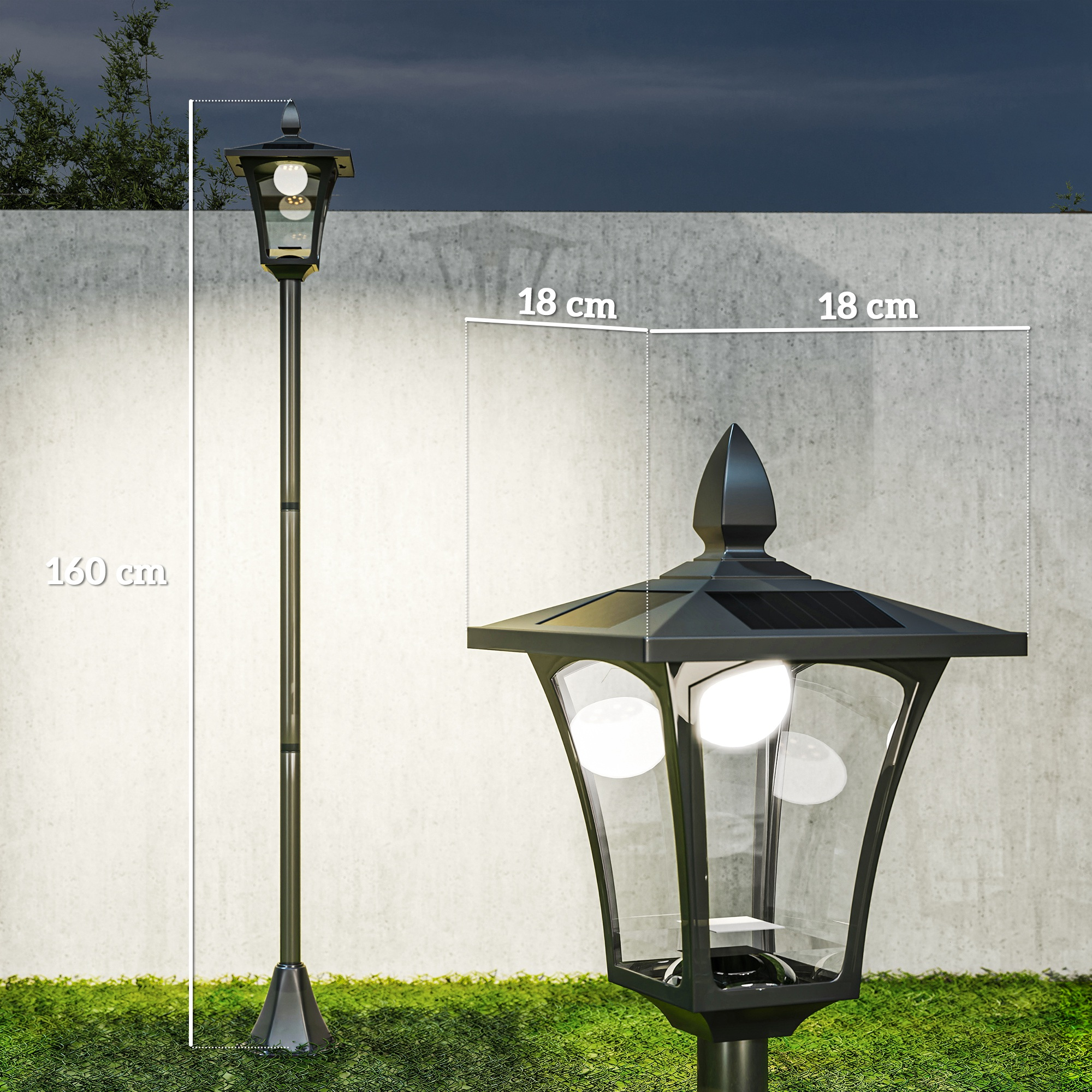 Una lámpara negra con energía solar y una carcasa de vidrio transparente. Está sobre césped verde con una pared de hormigón al fondo.
