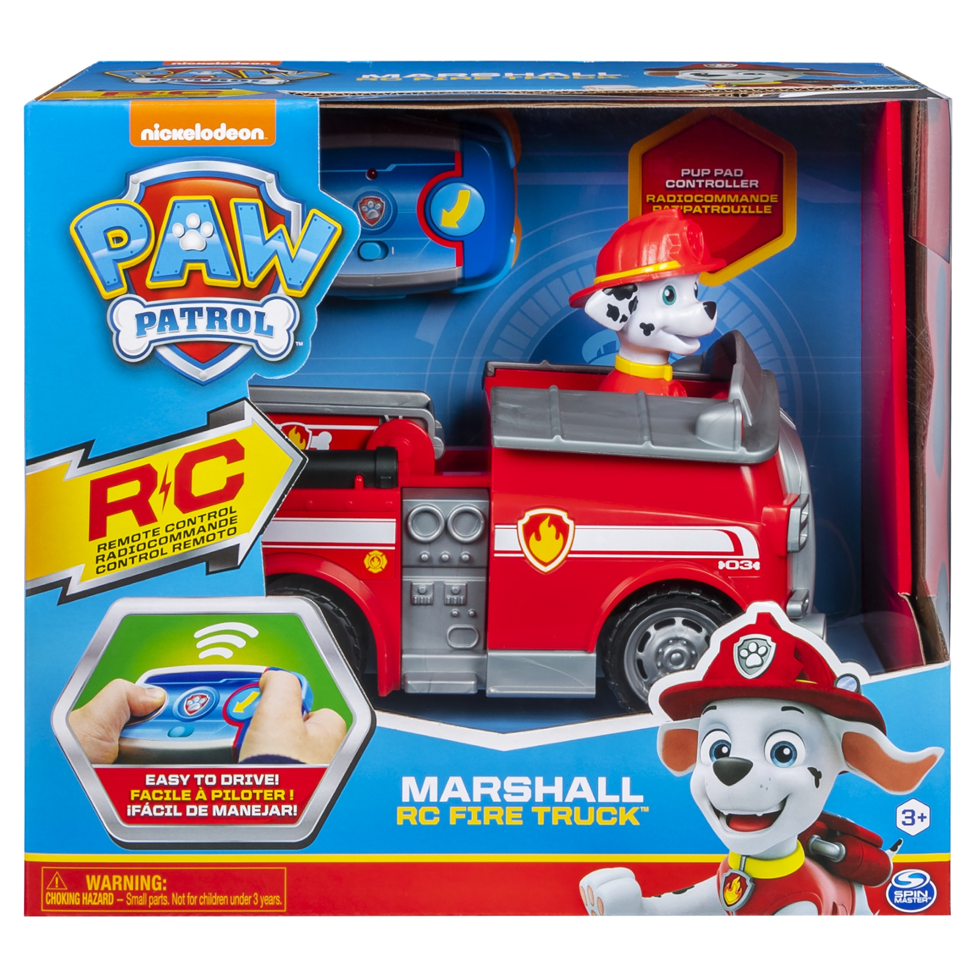 Un juguete de camión de bomberos RC de Paw Patrol Marshall en una caja. La caja presenta a Marshall y el camión.