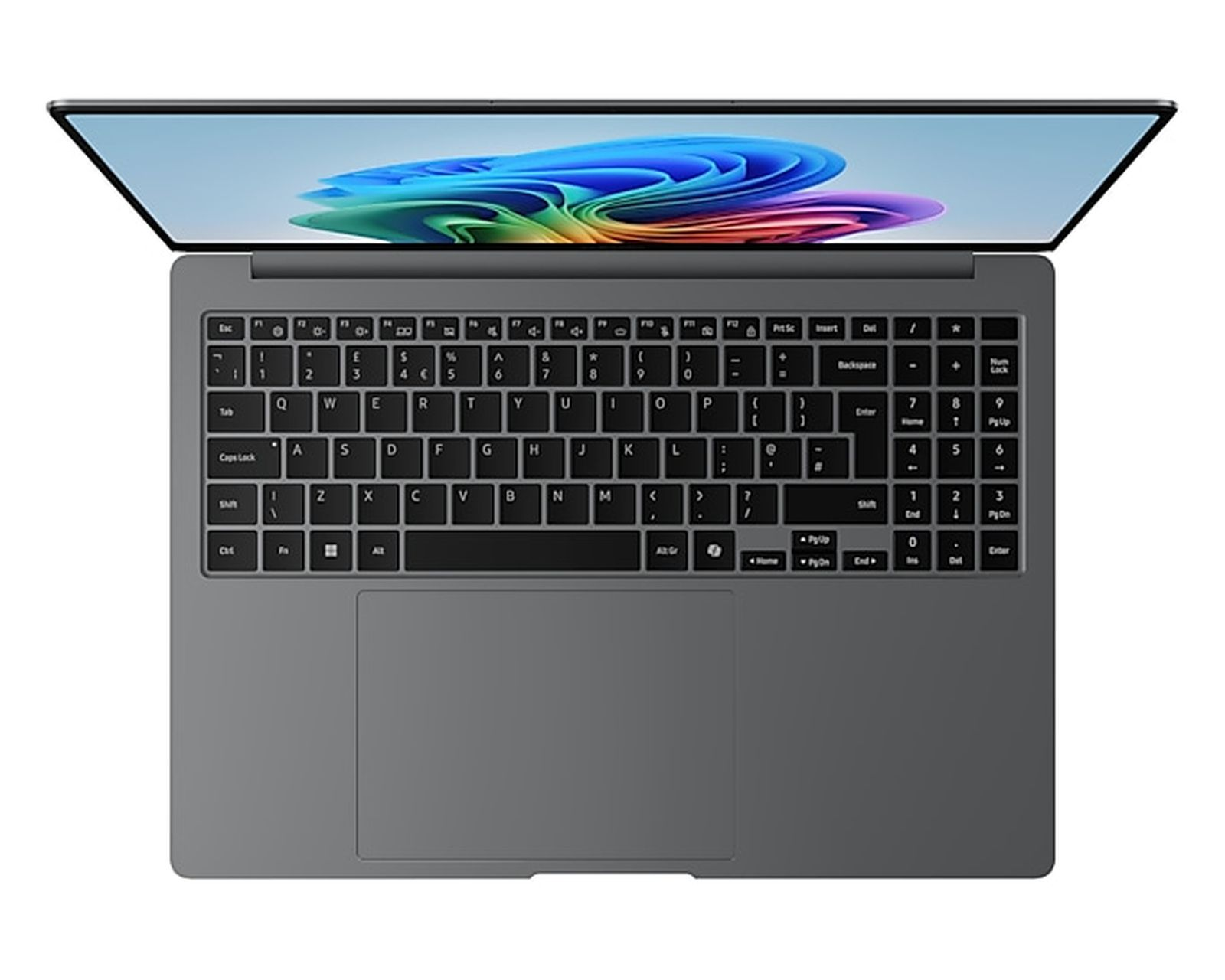 Szary laptop, otwarty, wyświetlający kolorowy abstrakcyjny obraz na ekranie. Klawiatura jest widoczna, z touchpadem poniżej.